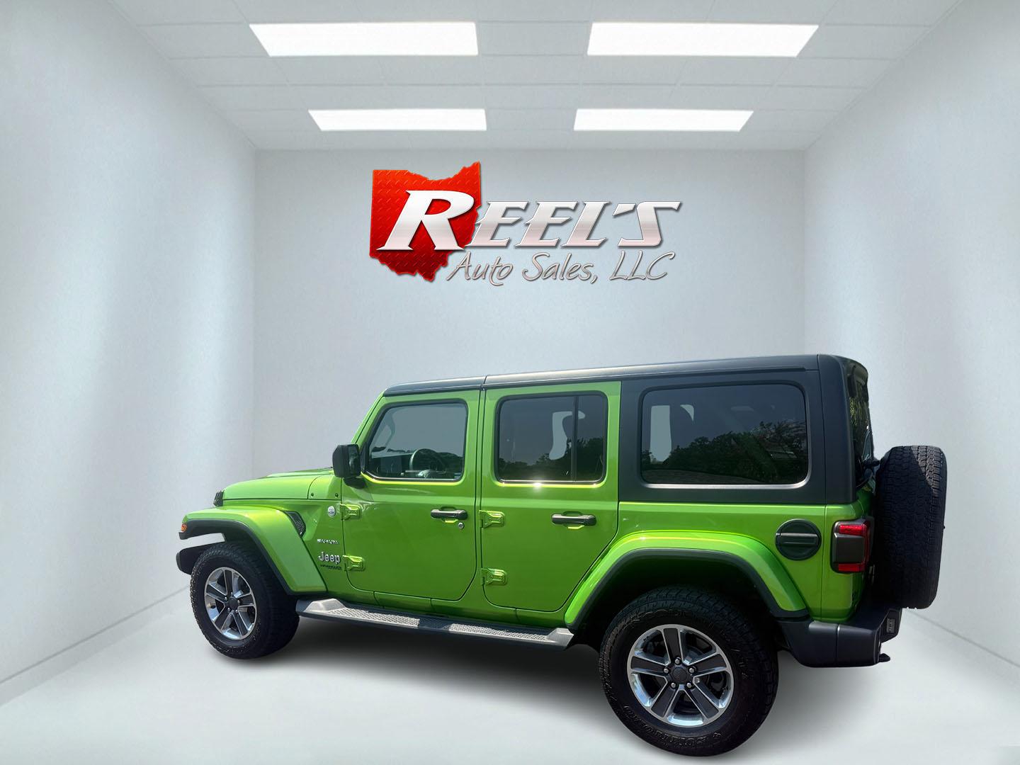 2019 Green /Black Jeep Wrangler Unlimited Sahara (1C4HJXEG1KW) with an 3.6L V6 DOHC 24V engine, 8-Speed Automatic transmission, located at 11115 Chardon Rd. , Chardon, OH, 44024, (440) 214-9705, 41.580246, -81.241943 - Photo#45