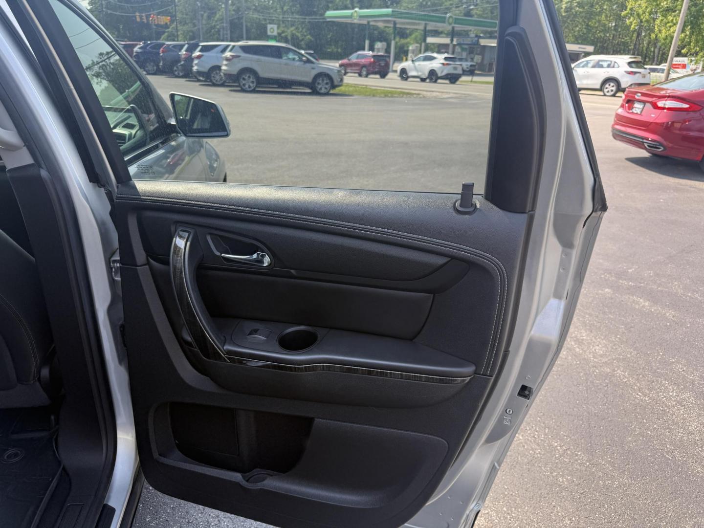 2015 Silver /Black GMC Acadia SLT-2 AWD (1GKKVSKD2FJ) with an 3.6L V6 DOHC 24V engine, 6-Speed Automatic transmission, located at 11115 Chardon Rd. , Chardon, OH, 44024, (440) 214-9705, 41.580246, -81.241943 - Photo#37