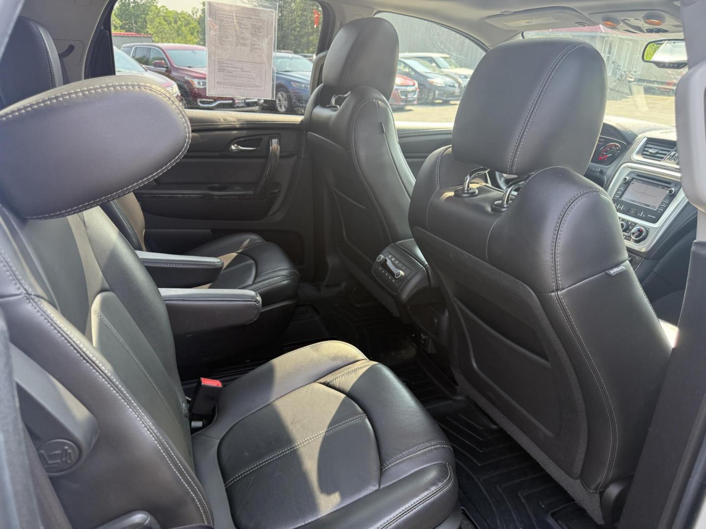 2015 Silver /Black GMC Acadia SLT-2 AWD (1GKKVSKD2FJ) with an 3.6L V6 DOHC 24V engine, 6-Speed Automatic transmission, located at 11115 Chardon Rd. , Chardon, OH, 44024, (440) 214-9705, 41.580246, -81.241943 - Photo#36