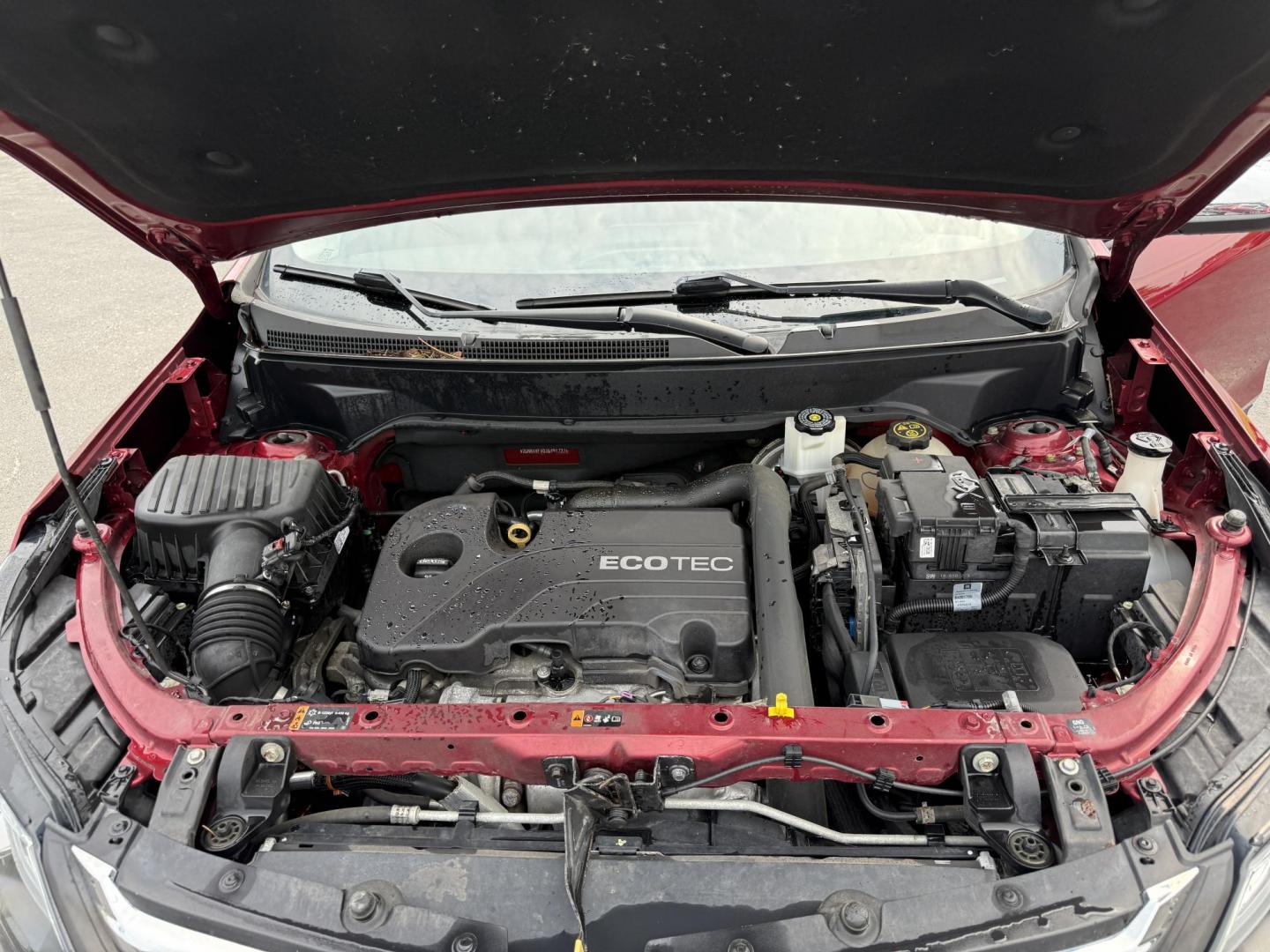 2018 Red /Black Chevrolet Equinox Premier AWD (2GNAXVEV0J6) with an 1.5L I4 DIR DOHC 16V TURBO engine, 6A transmission, located at 547 E. Main St., Orwell, OH, 44076, (440) 437-5893, 41.535435, -80.847855 - This 2018 Chevrolet Equinox Premier AWD offers a versatile and well-equipped compact SUV experience with a 1.5L turbocharged engine paired with a smooth 6-speed automatic transmission, delivering up to 30 MPG on the highway. Its luxurious interior features leather seats with heated and cooled front - Photo#3