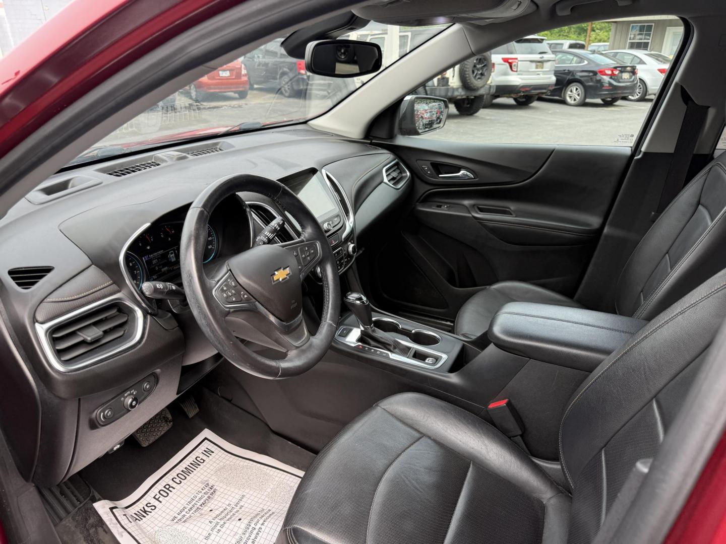 2018 Red /Black Chevrolet Equinox Premier AWD (2GNAXVEV0J6) with an 1.5L I4 DIR DOHC 16V TURBO engine, 6A transmission, located at 547 E. Main St., Orwell, OH, 44076, (440) 437-5893, 41.535435, -80.847855 - This 2018 Chevrolet Equinox Premier AWD offers a versatile and well-equipped compact SUV experience with a 1.5L turbocharged engine paired with a smooth 6-speed automatic transmission, delivering up to 30 MPG on the highway. Its luxurious interior features leather seats with heated and cooled front - Photo#8