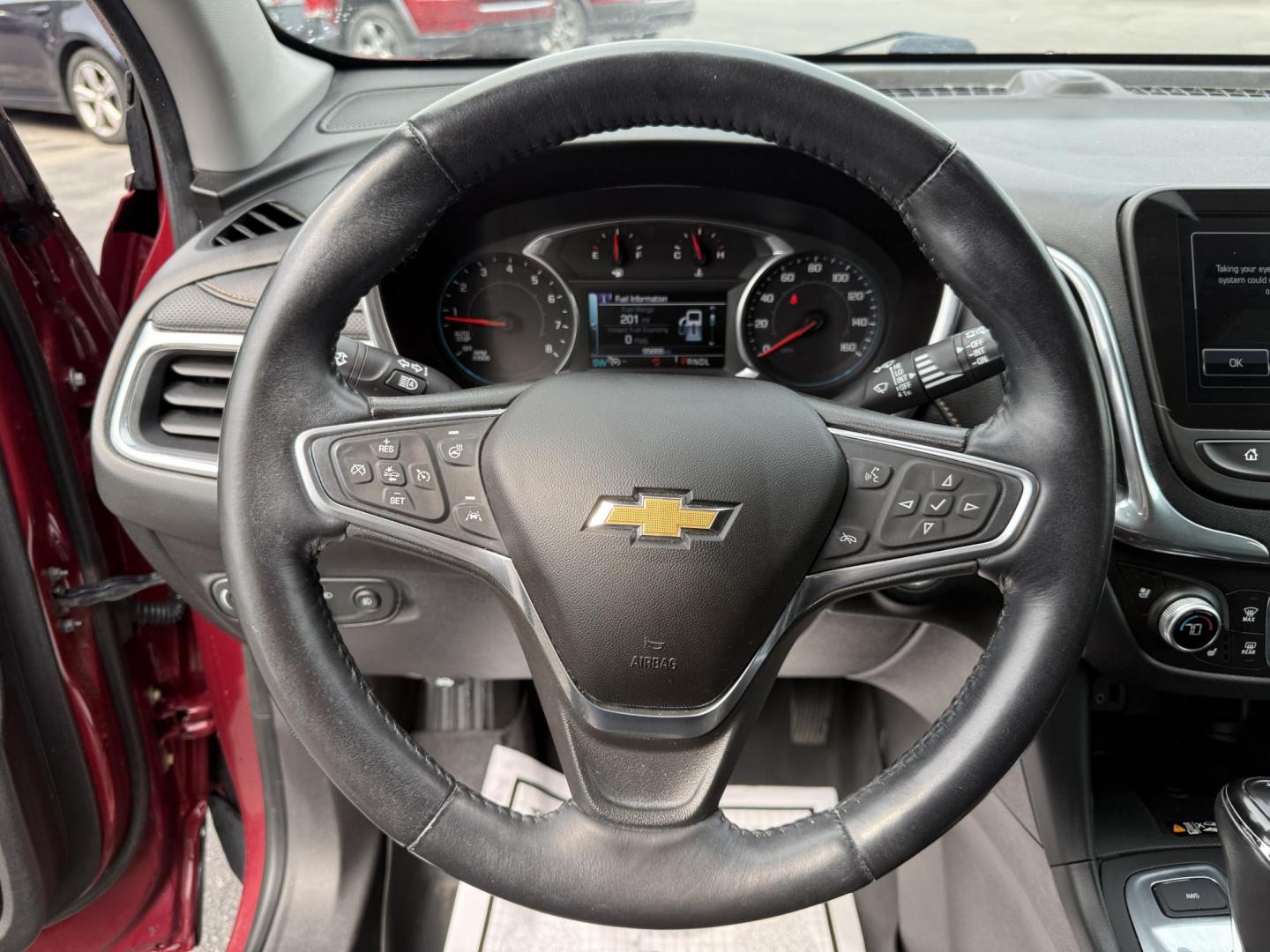 2018 Red /Black Chevrolet Equinox Premier AWD (2GNAXVEV0J6) with an 1.5L I4 DIR DOHC 16V TURBO engine, 6A transmission, located at 547 E. Main St., Orwell, OH, 44076, (440) 437-5893, 41.535435, -80.847855 - This 2018 Chevrolet Equinox Premier AWD offers a versatile and well-equipped compact SUV experience with a 1.5L turbocharged engine paired with a smooth 6-speed automatic transmission, delivering up to 30 MPG on the highway. Its luxurious interior features leather seats with heated and cooled front - Photo#16