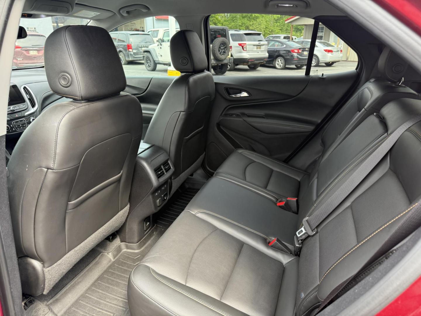 2018 Red /Black Chevrolet Equinox Premier AWD (2GNAXVEV0J6) with an 1.5L I4 DIR DOHC 16V TURBO engine, 6A transmission, located at 547 E. Main St., Orwell, OH, 44076, (440) 437-5893, 41.535435, -80.847855 - This 2018 Chevrolet Equinox Premier AWD offers a versatile and well-equipped compact SUV experience with a 1.5L turbocharged engine paired with a smooth 6-speed automatic transmission, delivering up to 30 MPG on the highway. Its luxurious interior features leather seats with heated and cooled front - Photo#24