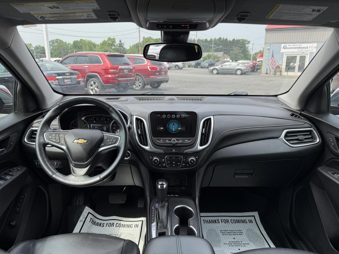 2018 Red /Black Chevrolet Equinox Premier AWD (2GNAXVEV0J6) with an 1.5L I4 DIR DOHC 16V TURBO engine, 6A transmission, located at 547 E. Main St., Orwell, OH, 44076, (440) 437-5893, 41.535435, -80.847855 - This 2018 Chevrolet Equinox Premier AWD offers a versatile and well-equipped compact SUV experience with a 1.5L turbocharged engine paired with a smooth 6-speed automatic transmission, delivering up to 30 MPG on the highway. Its luxurious interior features leather seats with heated and cooled front - Photo#29