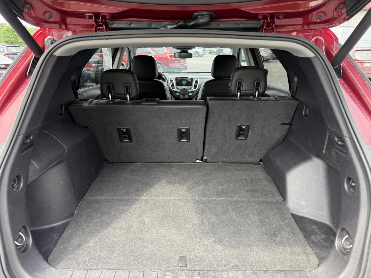 2018 Red /Black Chevrolet Equinox Premier AWD (2GNAXVEV0J6) with an 1.5L I4 DIR DOHC 16V TURBO engine, 6A transmission, located at 547 E. Main St., Orwell, OH, 44076, (440) 437-5893, 41.535435, -80.847855 - This 2018 Chevrolet Equinox Premier AWD offers a versatile and well-equipped compact SUV experience with a 1.5L turbocharged engine paired with a smooth 6-speed automatic transmission, delivering up to 30 MPG on the highway. Its luxurious interior features leather seats with heated and cooled front - Photo#30