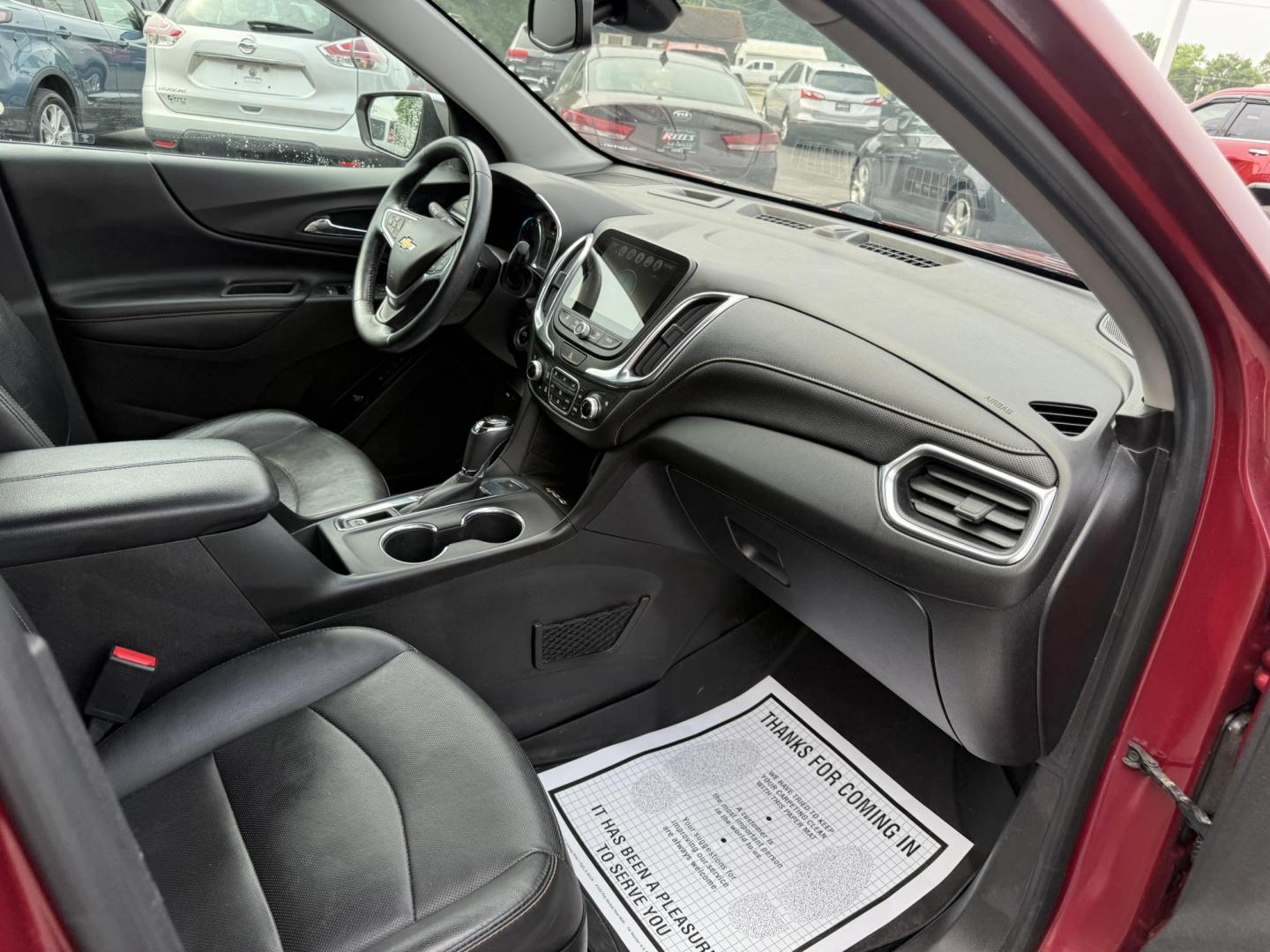 2018 Red /Black Chevrolet Equinox Premier AWD (2GNAXVEV0J6) with an 1.5L I4 DIR DOHC 16V TURBO engine, 6A transmission, located at 547 E. Main St., Orwell, OH, 44076, (440) 437-5893, 41.535435, -80.847855 - This 2018 Chevrolet Equinox Premier AWD offers a versatile and well-equipped compact SUV experience with a 1.5L turbocharged engine paired with a smooth 6-speed automatic transmission, delivering up to 30 MPG on the highway. Its luxurious interior features leather seats with heated and cooled front - Photo#35