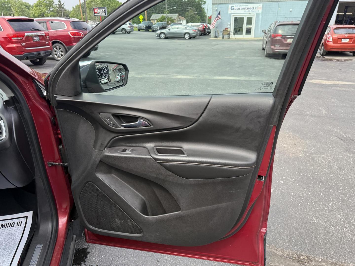 2018 Red /Black Chevrolet Equinox Premier AWD (2GNAXVEV0J6) with an 1.5L I4 DIR DOHC 16V TURBO engine, 6A transmission, located at 547 E. Main St., Orwell, OH, 44076, (440) 437-5893, 41.535435, -80.847855 - This 2018 Chevrolet Equinox Premier AWD offers a versatile and well-equipped compact SUV experience with a 1.5L turbocharged engine paired with a smooth 6-speed automatic transmission, delivering up to 30 MPG on the highway. Its luxurious interior features leather seats with heated and cooled front - Photo#40