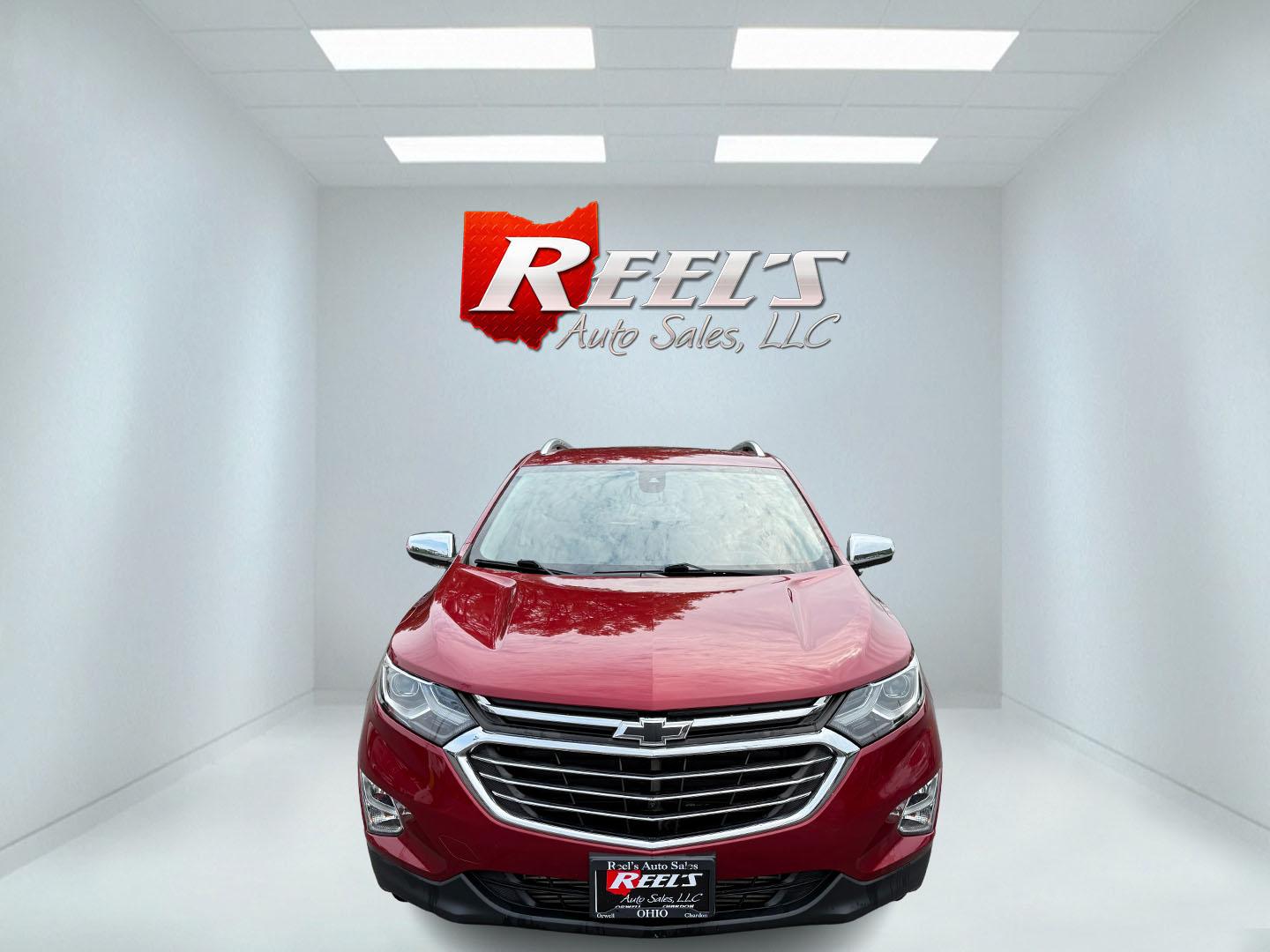 2018 Red /Black Chevrolet Equinox Premier AWD (2GNAXVEV0J6) with an 1.5L I4 DIR DOHC 16V TURBO engine, 6A transmission, located at 547 E. Main St., Orwell, OH, 44076, (440) 437-5893, 41.535435, -80.847855 - This 2018 Chevrolet Equinox Premier AWD offers a versatile and well-equipped compact SUV experience with a 1.5L turbocharged engine paired with a smooth 6-speed automatic transmission, delivering up to 30 MPG on the highway. Its luxurious interior features leather seats with heated and cooled front - Photo#1