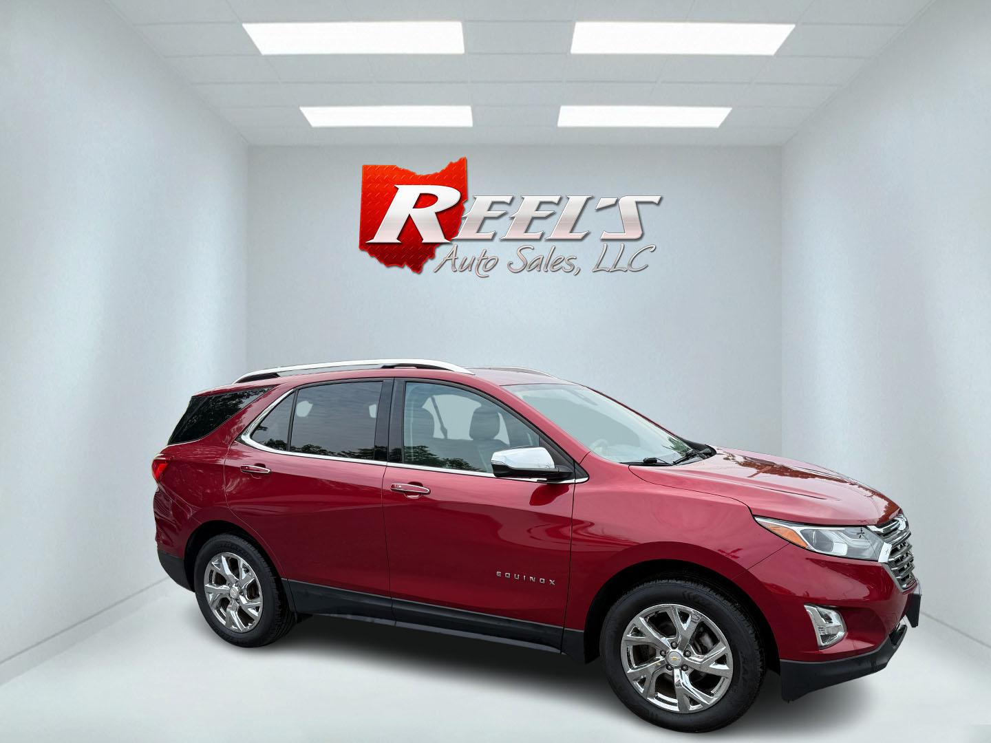 2018 Red /Black Chevrolet Equinox Premier AWD (2GNAXVEV0J6) with an 1.5L I4 DIR DOHC 16V TURBO engine, 6A transmission, located at 547 E. Main St., Orwell, OH, 44076, (440) 437-5893, 41.535435, -80.847855 - This 2018 Chevrolet Equinox Premier AWD offers a versatile and well-equipped compact SUV experience with a 1.5L turbocharged engine paired with a smooth 6-speed automatic transmission, delivering up to 30 MPG on the highway. Its luxurious interior features leather seats with heated and cooled front - Photo#41
