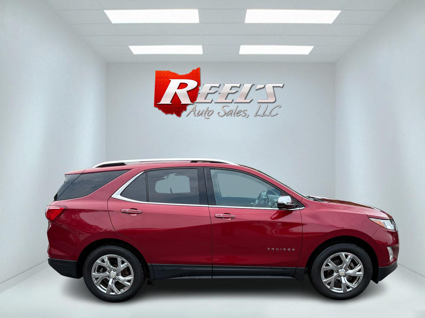 2018 Red /Black Chevrolet Equinox Premier AWD (2GNAXVEV0J6) with an 1.5L I4 DIR DOHC 16V TURBO engine, 6A transmission, located at 547 E. Main St., Orwell, OH, 44076, (440) 437-5893, 41.535435, -80.847855 - This 2018 Chevrolet Equinox Premier AWD offers a versatile and well-equipped compact SUV experience with a 1.5L turbocharged engine paired with a smooth 6-speed automatic transmission, delivering up to 30 MPG on the highway. Its luxurious interior features leather seats with heated and cooled front - Photo#42