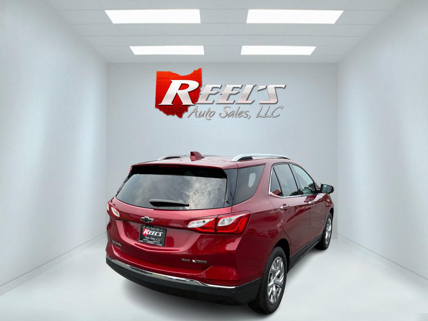 2018 Red /Black Chevrolet Equinox Premier AWD (2GNAXVEV0J6) with an 1.5L I4 DIR DOHC 16V TURBO engine, 6A transmission, located at 547 E. Main St., Orwell, OH, 44076, (440) 437-5893, 41.535435, -80.847855 - This 2018 Chevrolet Equinox Premier AWD offers a versatile and well-equipped compact SUV experience with a 1.5L turbocharged engine paired with a smooth 6-speed automatic transmission, delivering up to 30 MPG on the highway. Its luxurious interior features leather seats with heated and cooled front - Photo#43