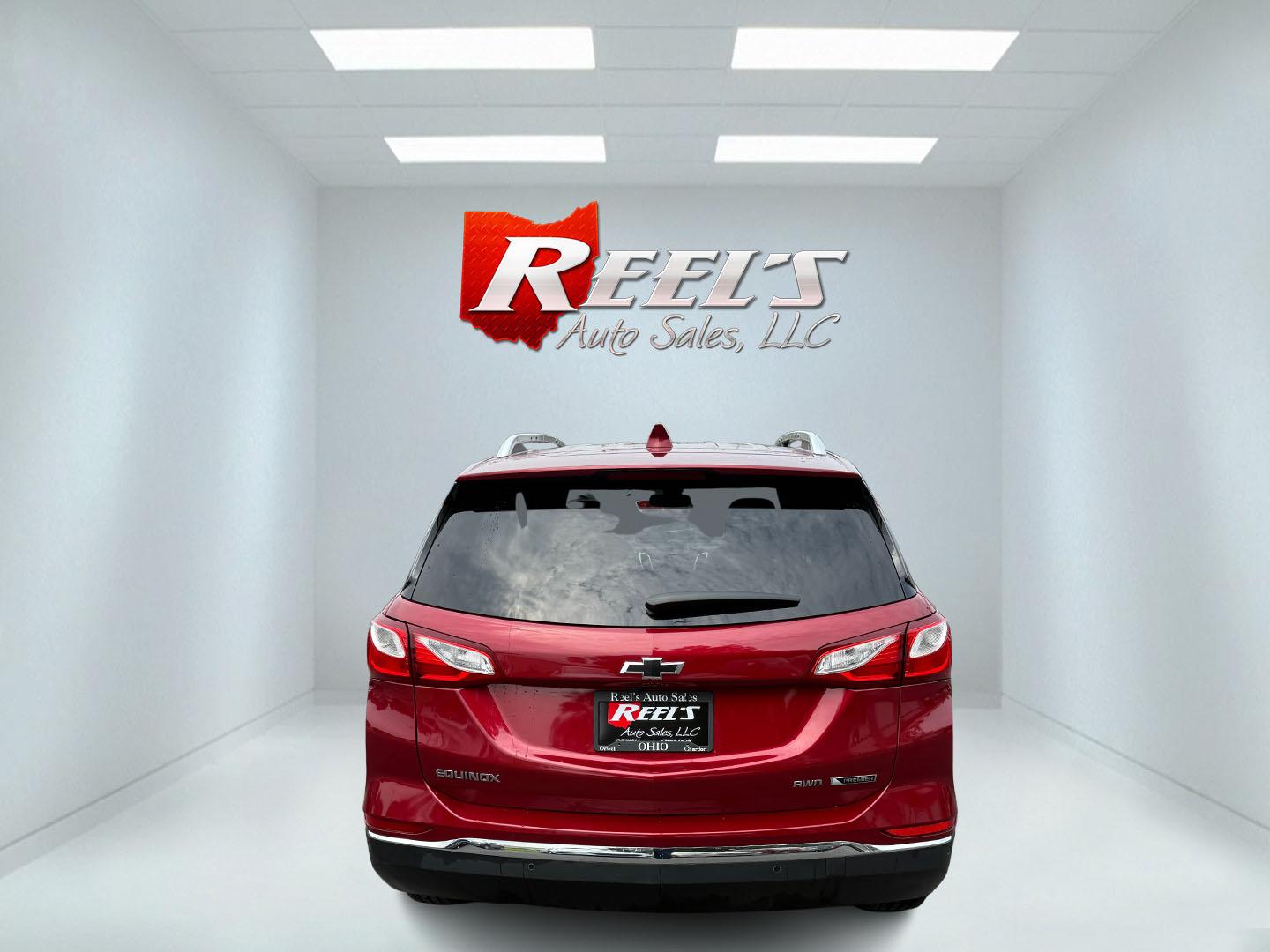 2018 Red /Black Chevrolet Equinox Premier AWD (2GNAXVEV0J6) with an 1.5L I4 DIR DOHC 16V TURBO engine, 6A transmission, located at 547 E. Main St., Orwell, OH, 44076, (440) 437-5893, 41.535435, -80.847855 - This 2018 Chevrolet Equinox Premier AWD offers a versatile and well-equipped compact SUV experience with a 1.5L turbocharged engine paired with a smooth 6-speed automatic transmission, delivering up to 30 MPG on the highway. Its luxurious interior features leather seats with heated and cooled front - Photo#44