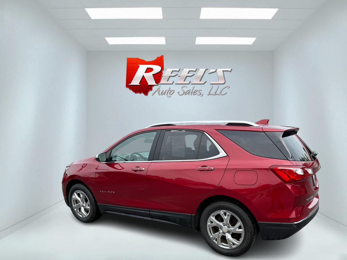 2018 Red /Black Chevrolet Equinox Premier AWD (2GNAXVEV0J6) with an 1.5L I4 DIR DOHC 16V TURBO engine, 6A transmission, located at 547 E. Main St., Orwell, OH, 44076, (440) 437-5893, 41.535435, -80.847855 - This 2018 Chevrolet Equinox Premier AWD offers a versatile and well-equipped compact SUV experience with a 1.5L turbocharged engine paired with a smooth 6-speed automatic transmission, delivering up to 30 MPG on the highway. Its luxurious interior features leather seats with heated and cooled front - Photo#46