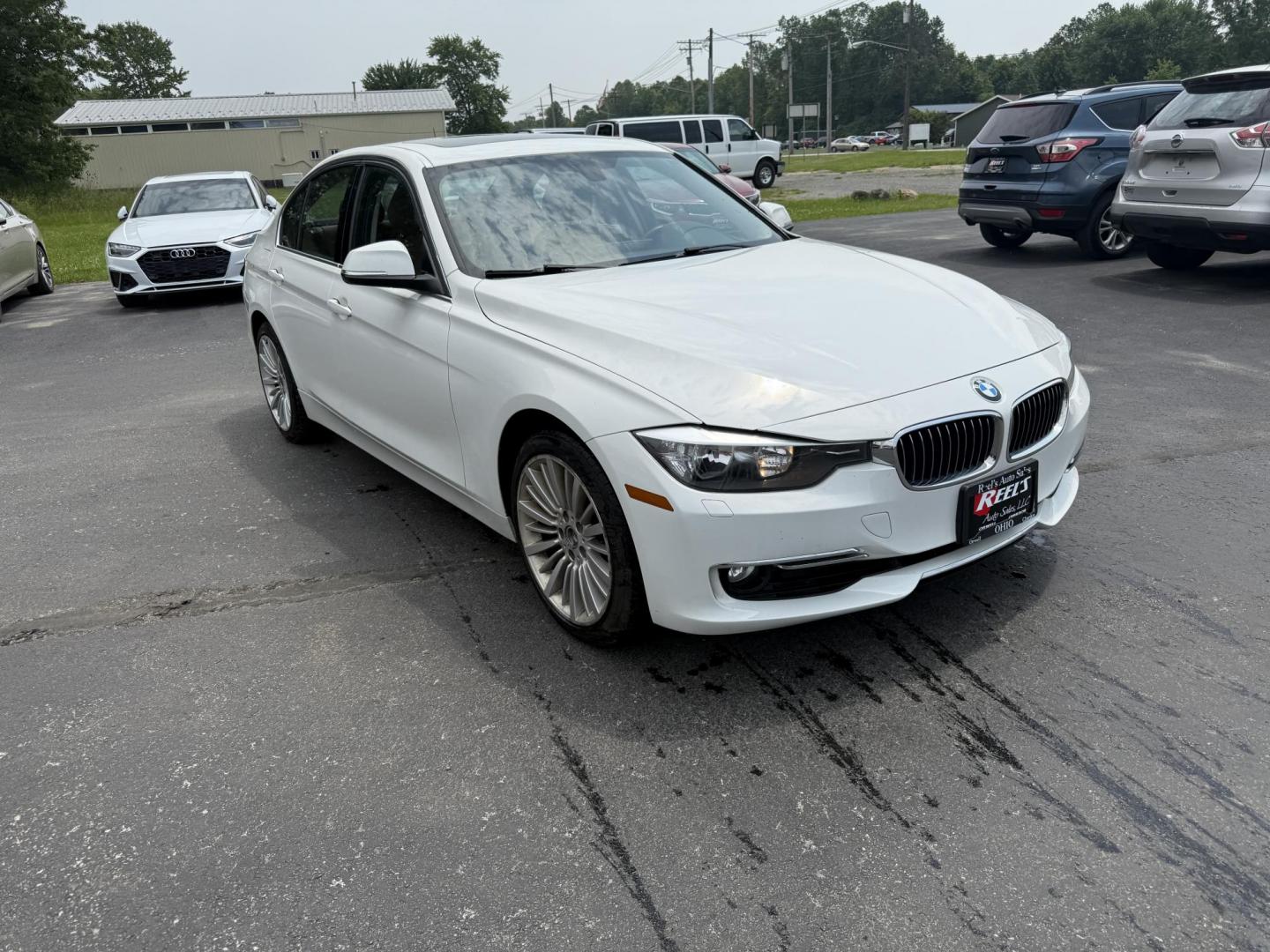 2013 White /Brown BMW 3-Series 328i xDrive Sedan (WBA3B3C58DF) with an 2.0L I4 DOHC 16V TURBO engine, 8-Speed Automatic transmission, located at 547 E. Main St., Orwell, OH, 44076, (440) 437-5893, 41.535435, -80.847855 - Photo#2