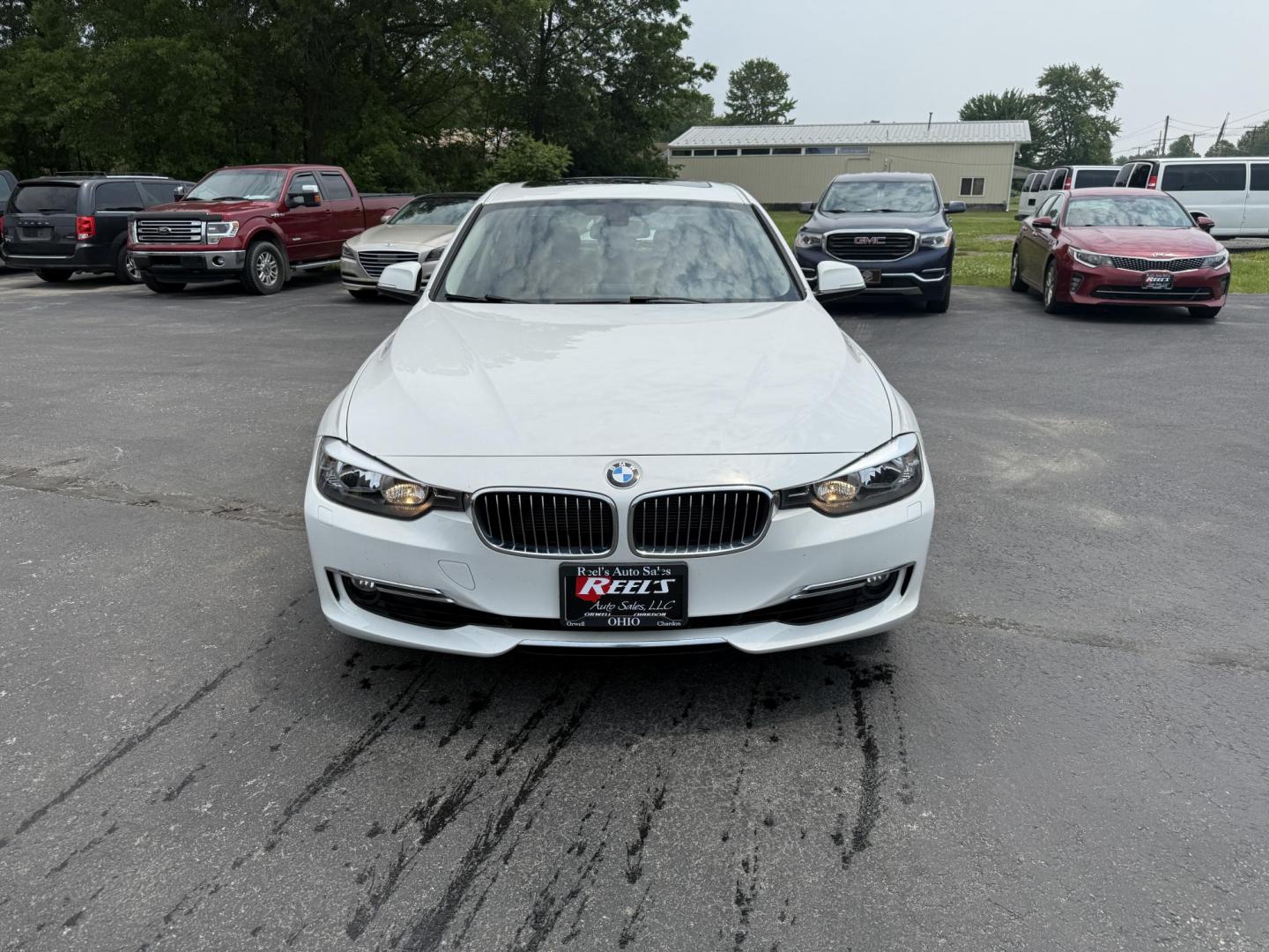 2013 White /Brown BMW 3-Series 328i xDrive Sedan (WBA3B3C58DF) with an 2.0L I4 DOHC 16V TURBO engine, 8-Speed Automatic transmission, located at 547 E. Main St., Orwell, OH, 44076, (440) 437-5893, 41.535435, -80.847855 - Photo#1