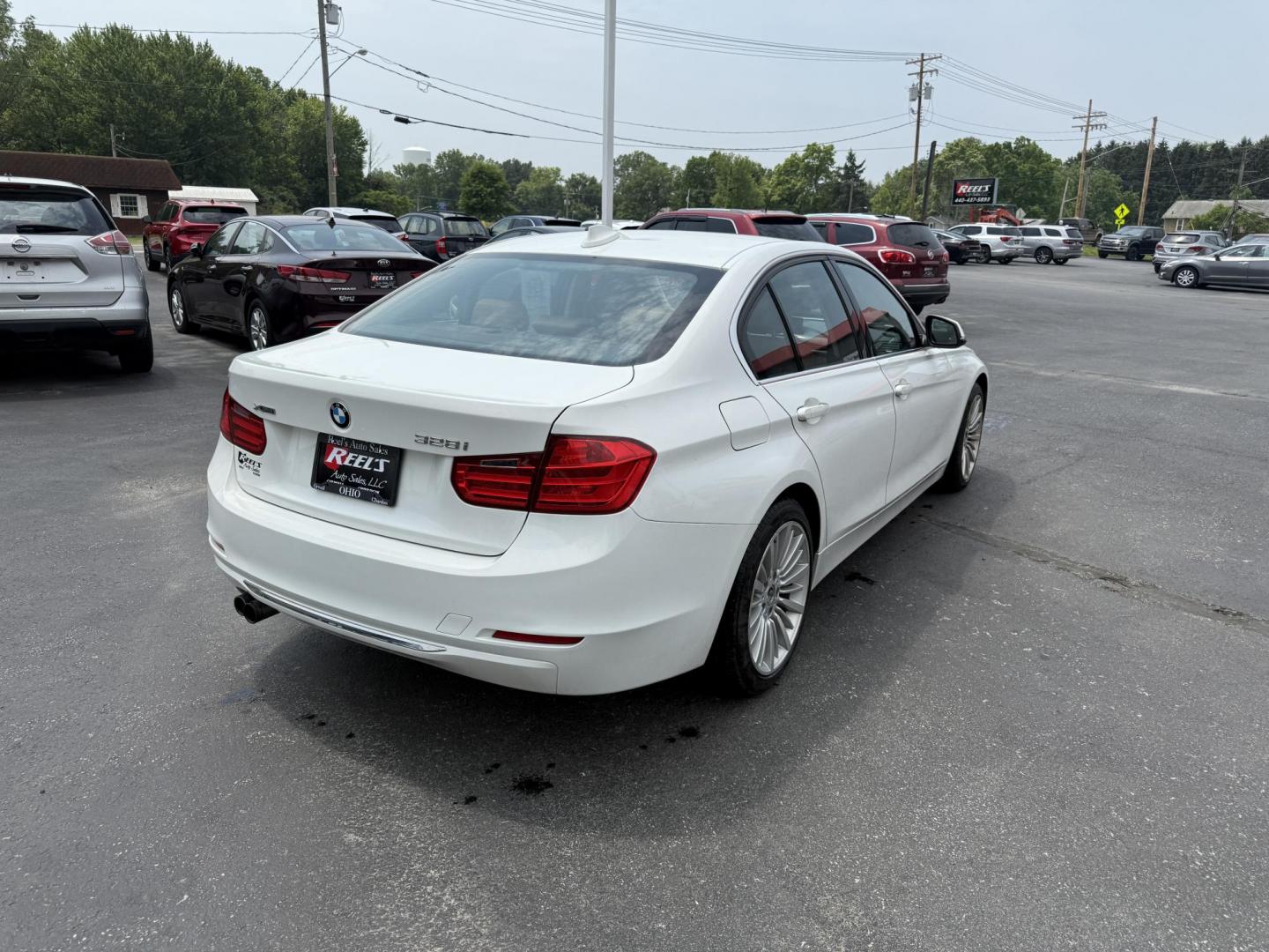 2013 White /Brown BMW 3-Series 328i xDrive Sedan (WBA3B3C58DF) with an 2.0L I4 DOHC 16V TURBO engine, 8-Speed Automatic transmission, located at 547 E. Main St., Orwell, OH, 44076, (440) 437-5893, 41.535435, -80.847855 - Photo#7