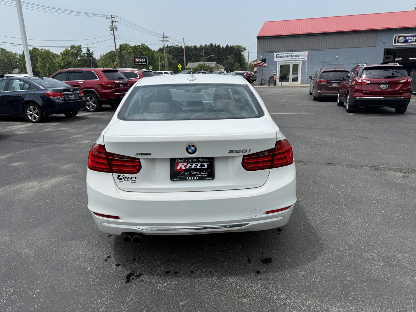 2013 White /Brown BMW 3-Series 328i xDrive Sedan (WBA3B3C58DF) with an 2.0L I4 DOHC 16V TURBO engine, 8-Speed Automatic transmission, located at 547 E. Main St., Orwell, OH, 44076, (440) 437-5893, 41.535435, -80.847855 - Photo#8