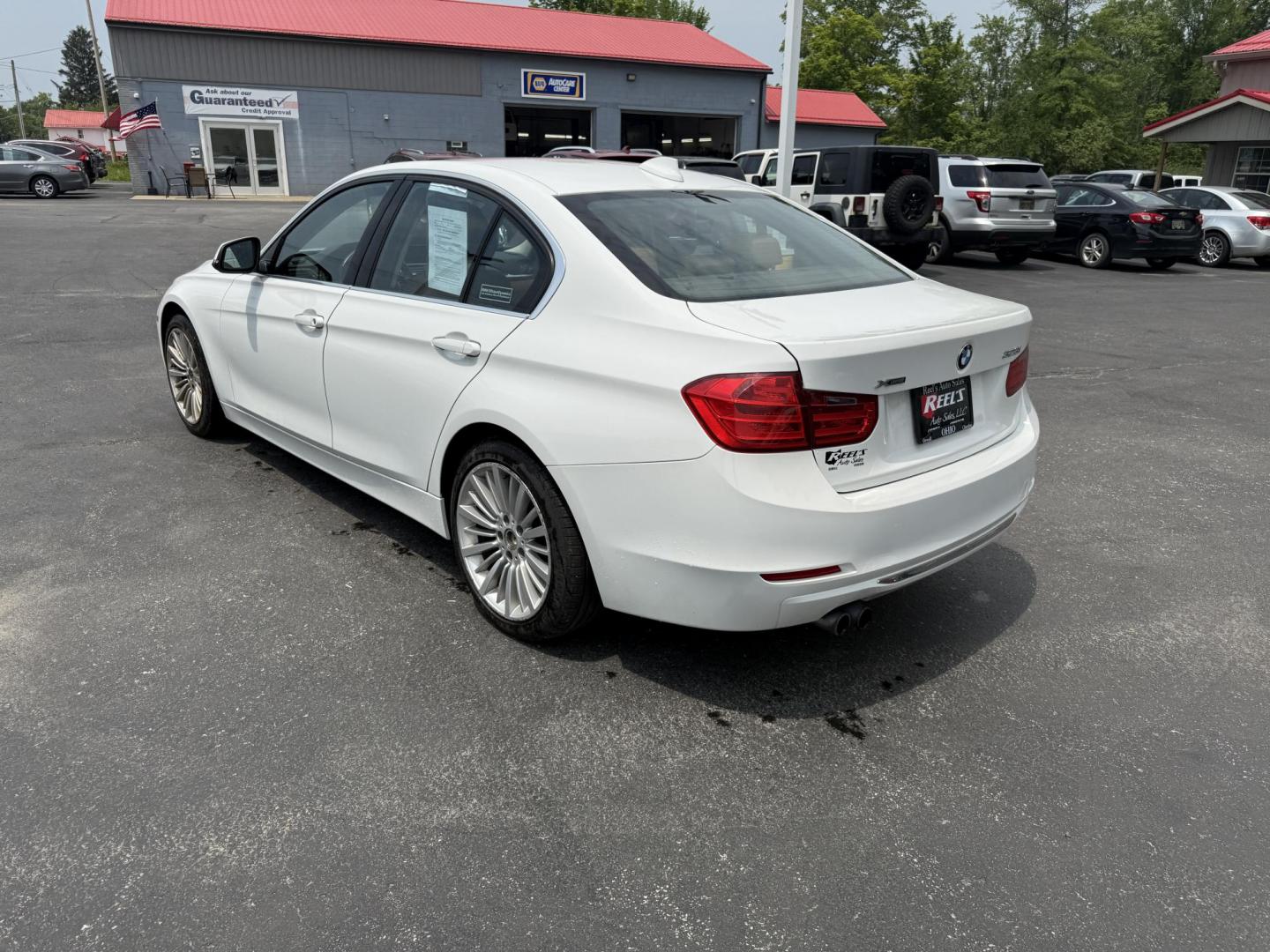 2013 White /Brown BMW 3-Series 328i xDrive Sedan (WBA3B3C58DF) with an 2.0L I4 DOHC 16V TURBO engine, 8-Speed Automatic transmission, located at 547 E. Main St., Orwell, OH, 44076, (440) 437-5893, 41.535435, -80.847855 - Photo#9