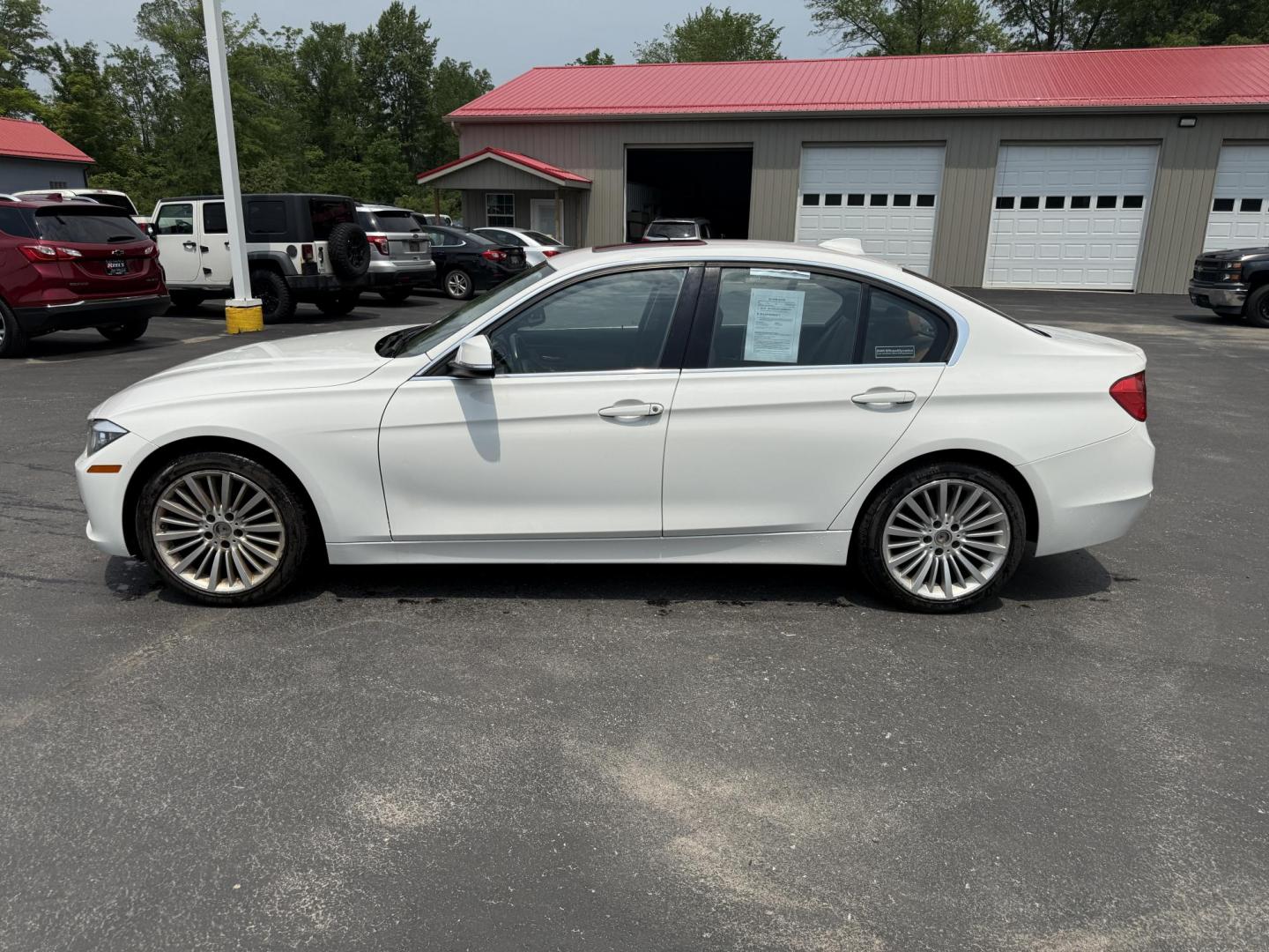 2013 White /Brown BMW 3-Series 328i xDrive Sedan (WBA3B3C58DF) with an 2.0L I4 DOHC 16V TURBO engine, 8-Speed Automatic transmission, located at 547 E. Main St., Orwell, OH, 44076, (440) 437-5893, 41.535435, -80.847855 - Photo#12