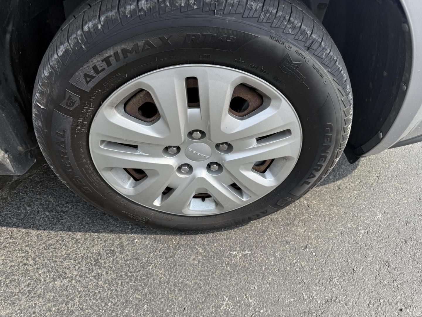 2016 Silver /Black Dodge Journey SE AWD (3C4PDDAG5GT) with an 3.6L V6 DOHC 24V engine, 6A transmission, located at 11115 Chardon Rd. , Chardon, OH, 44024, (440) 214-9705, 41.580246, -81.241943 - This One Owner 2016 Dodge Journey SE AWD is a practical midsize SUV equipped with a 3.6L Pentastar V6 engine and a 6-speed automatic transmission, offering reliable performance and all-wheel drive for added traction. It features daytime running lights, push-button start for convenience, and a 4.3-in - Photo#4