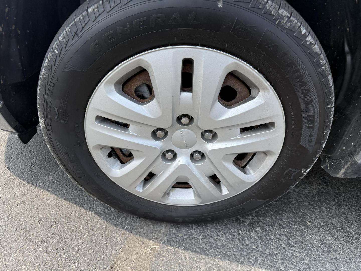2016 Silver /Black Dodge Journey SE AWD (3C4PDDAG5GT) with an 3.6L V6 DOHC 24V engine, 6A transmission, located at 11115 Chardon Rd. , Chardon, OH, 44024, (440) 214-9705, 41.580246, -81.241943 - This One Owner 2016 Dodge Journey SE AWD is a practical midsize SUV equipped with a 3.6L Pentastar V6 engine and a 6-speed automatic transmission, offering reliable performance and all-wheel drive for added traction. It features daytime running lights, push-button start for convenience, and a 4.3-in - Photo#7