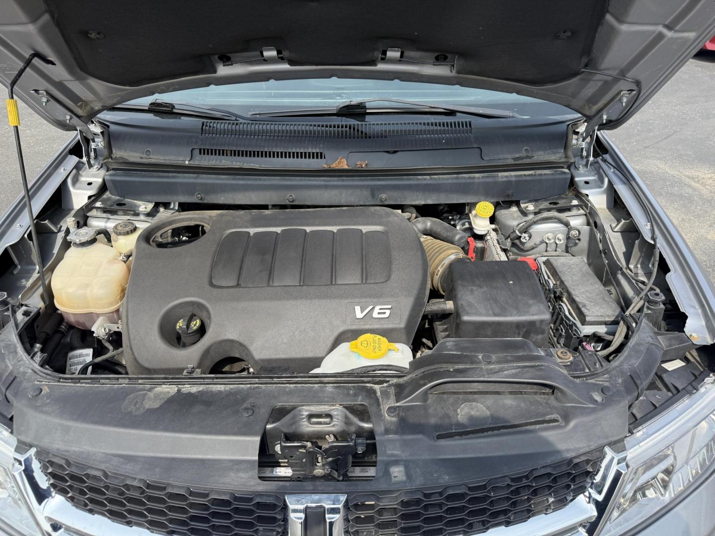 2016 Silver /Black Dodge Journey SE AWD (3C4PDDAG5GT) with an 3.6L V6 DOHC 24V engine, 6A transmission, located at 11115 Chardon Rd. , Chardon, OH, 44024, (440) 214-9705, 41.580246, -81.241943 - This One Owner 2016 Dodge Journey SE AWD is a practical midsize SUV equipped with a 3.6L Pentastar V6 engine and a 6-speed automatic transmission, offering reliable performance and all-wheel drive for added traction. It features daytime running lights, push-button start for convenience, and a 4.3-in - Photo#3