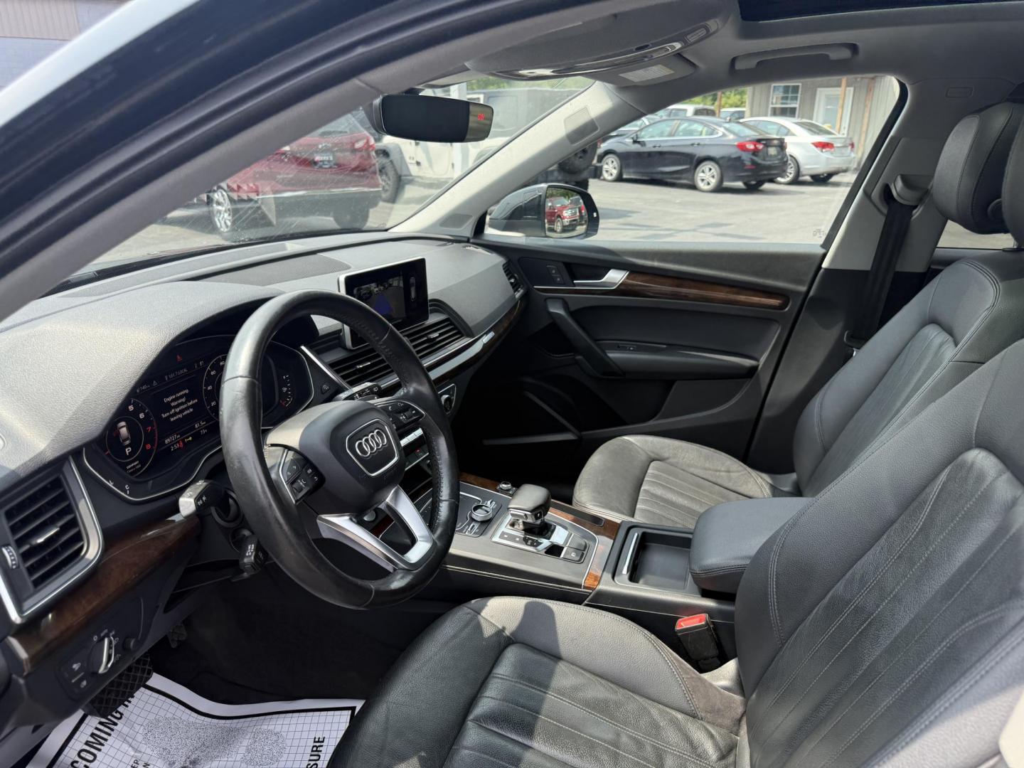 2018 Black /Black Audi Q5 2.0T Premium Plus quattro (WA1BNAFY0J2) with an 2.0L I4 DOHC 16V TURBO engine, 7A transmission, located at 547 E. Main St., Orwell, OH, 44076, (440) 437-5893, 41.535435, -80.847855 - This 2018 Audi G5 Premium Plus offers a refined driving experience with its 2.0L turbocharged I4 engine and 7-speed automatic transmission paired with Quattro all-wheel drive for superior handling. Its luxurious leather interior features power front seats, a heated steering wheel, and a Bang & Olufs - Photo#8