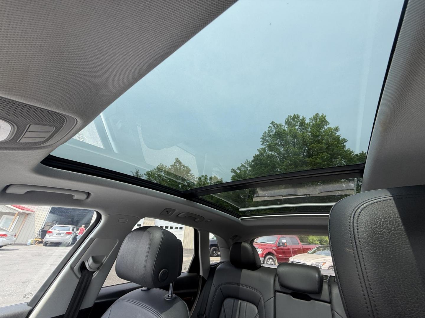 2018 Black /Black Audi Q5 2.0T Premium Plus quattro (WA1BNAFY0J2) with an 2.0L I4 DOHC 16V TURBO engine, 7A transmission, located at 547 E. Main St., Orwell, OH, 44076, (440) 437-5893, 41.535435, -80.847855 - This 2018 Audi G5 Premium Plus offers a refined driving experience with its 2.0L turbocharged I4 engine and 7-speed automatic transmission paired with Quattro all-wheel drive for superior handling. Its luxurious leather interior features power front seats, a heated steering wheel, and a Bang & Olufs - Photo#26