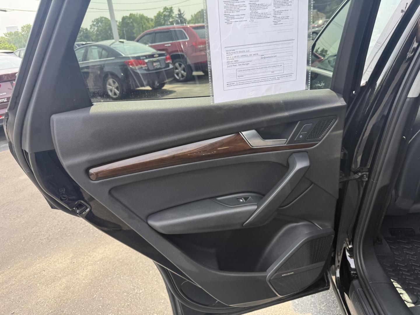 2018 Black /Black Audi Q5 2.0T Premium Plus quattro (WA1BNAFY0J2) with an 2.0L I4 DOHC 16V TURBO engine, 7A transmission, located at 547 E. Main St., Orwell, OH, 44076, (440) 437-5893, 41.535435, -80.847855 - This 2018 Audi G5 Premium Plus offers a refined driving experience with its 2.0L turbocharged I4 engine and 7-speed automatic transmission paired with Quattro all-wheel drive for superior handling. Its luxurious leather interior features power front seats, a heated steering wheel, and a Bang & Olufs - Photo#29