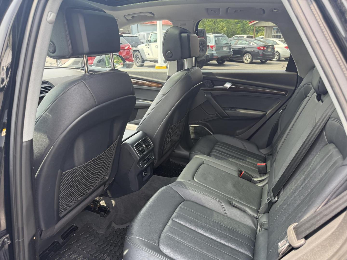 2018 Black /Black Audi Q5 2.0T Premium Plus quattro (WA1BNAFY0J2) with an 2.0L I4 DOHC 16V TURBO engine, 7A transmission, located at 547 E. Main St., Orwell, OH, 44076, (440) 437-5893, 41.535435, -80.847855 - This 2018 Audi G5 Premium Plus offers a refined driving experience with its 2.0L turbocharged I4 engine and 7-speed automatic transmission paired with Quattro all-wheel drive for superior handling. Its luxurious leather interior features power front seats, a heated steering wheel, and a Bang & Olufs - Photo#28