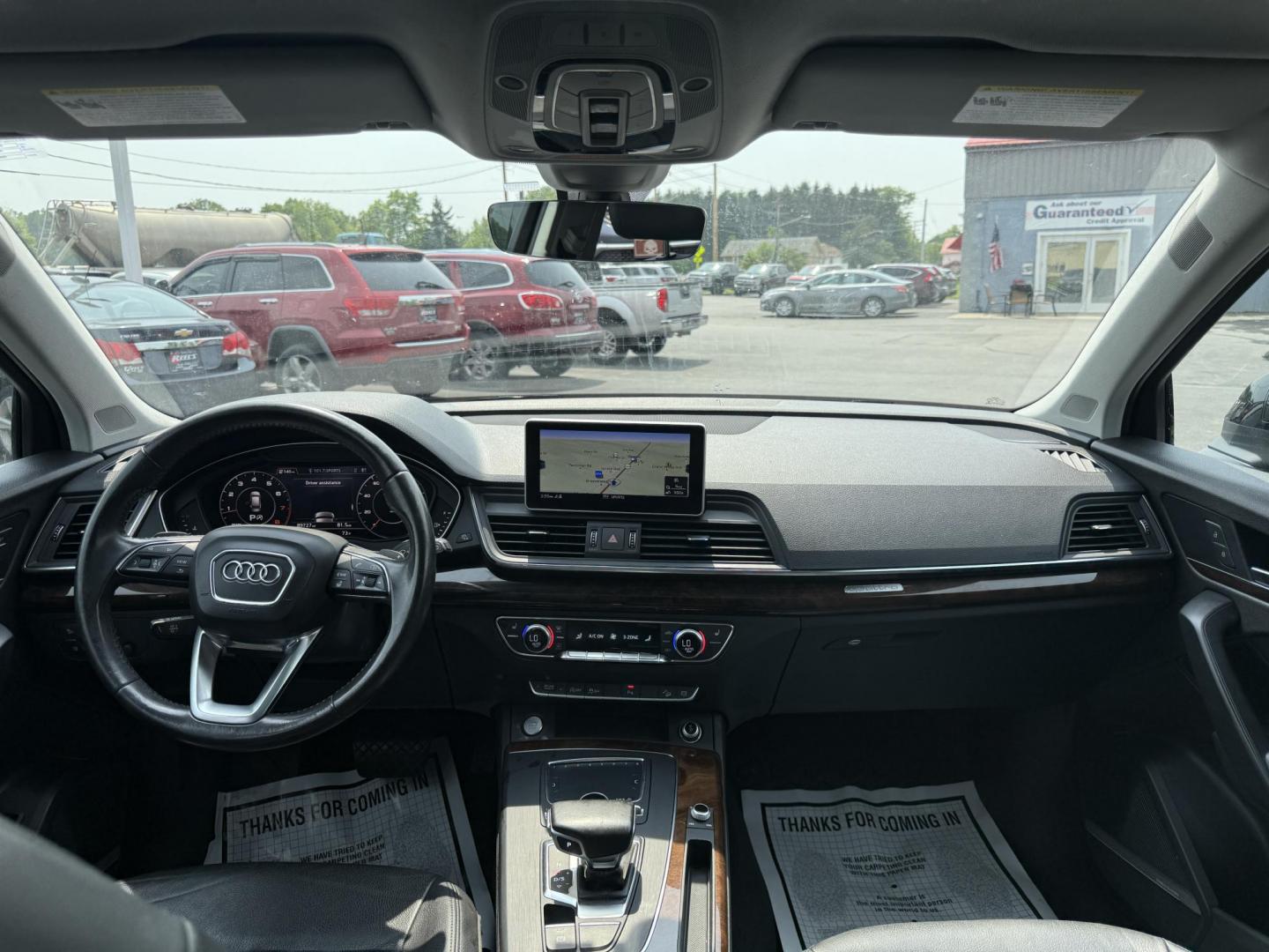 2018 Black /Black Audi Q5 2.0T Premium Plus quattro (WA1BNAFY0J2) with an 2.0L I4 DOHC 16V TURBO engine, 7A transmission, located at 547 E. Main St., Orwell, OH, 44076, (440) 437-5893, 41.535435, -80.847855 - This 2018 Audi G5 Premium Plus offers a refined driving experience with its 2.0L turbocharged I4 engine and 7-speed automatic transmission paired with Quattro all-wheel drive for superior handling. Its luxurious leather interior features power front seats, a heated steering wheel, and a Bang & Olufs - Photo#31