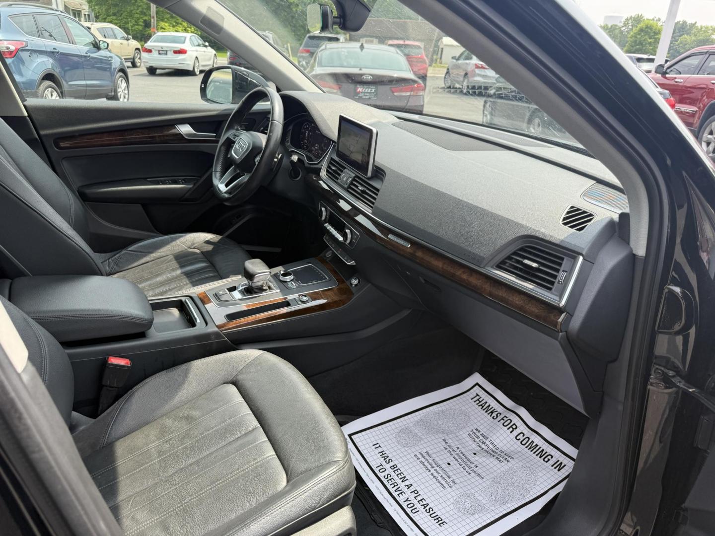 2018 Black /Black Audi Q5 2.0T Premium Plus quattro (WA1BNAFY0J2) with an 2.0L I4 DOHC 16V TURBO engine, 7A transmission, located at 547 E. Main St., Orwell, OH, 44076, (440) 437-5893, 41.535435, -80.847855 - This 2018 Audi G5 Premium Plus offers a refined driving experience with its 2.0L turbocharged I4 engine and 7-speed automatic transmission paired with Quattro all-wheel drive for superior handling. Its luxurious leather interior features power front seats, a heated steering wheel, and a Bang & Olufs - Photo#36