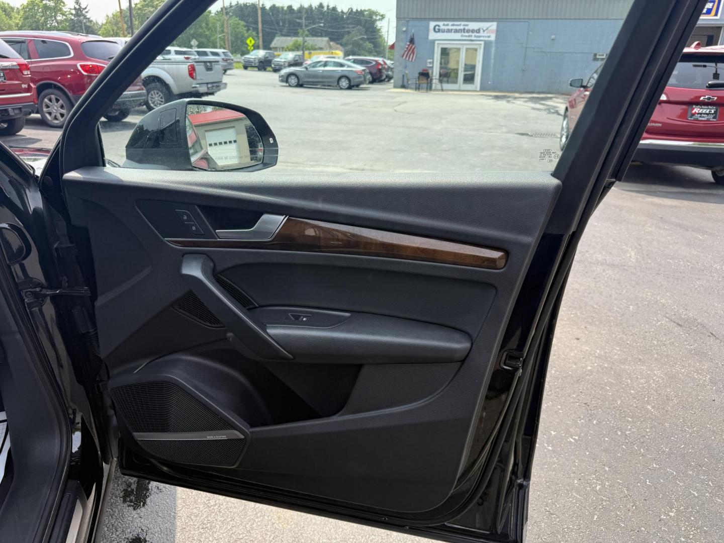 2018 Black /Black Audi Q5 2.0T Premium Plus quattro (WA1BNAFY0J2) with an 2.0L I4 DOHC 16V TURBO engine, 7A transmission, located at 547 E. Main St., Orwell, OH, 44076, (440) 437-5893, 41.535435, -80.847855 - This 2018 Audi G5 Premium Plus offers a refined driving experience with its 2.0L turbocharged I4 engine and 7-speed automatic transmission paired with Quattro all-wheel drive for superior handling. Its luxurious leather interior features power front seats, a heated steering wheel, and a Bang & Olufs - Photo#41