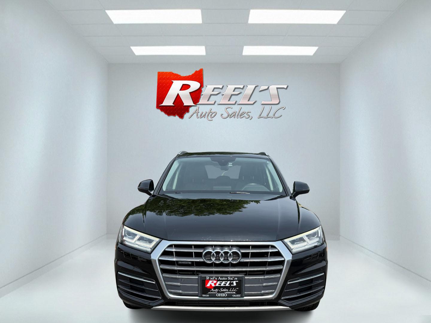 2018 Black /Black Audi Q5 2.0T Premium Plus quattro (WA1BNAFY0J2) with an 2.0L I4 DOHC 16V TURBO engine, 7A transmission, located at 547 E. Main St., Orwell, OH, 44076, (440) 437-5893, 41.535435, -80.847855 - This 2018 Audi G5 Premium Plus offers a refined driving experience with its 2.0L turbocharged I4 engine and 7-speed automatic transmission paired with Quattro all-wheel drive for superior handling. Its luxurious leather interior features power front seats, a heated steering wheel, and a Bang & Olufs - Photo#1