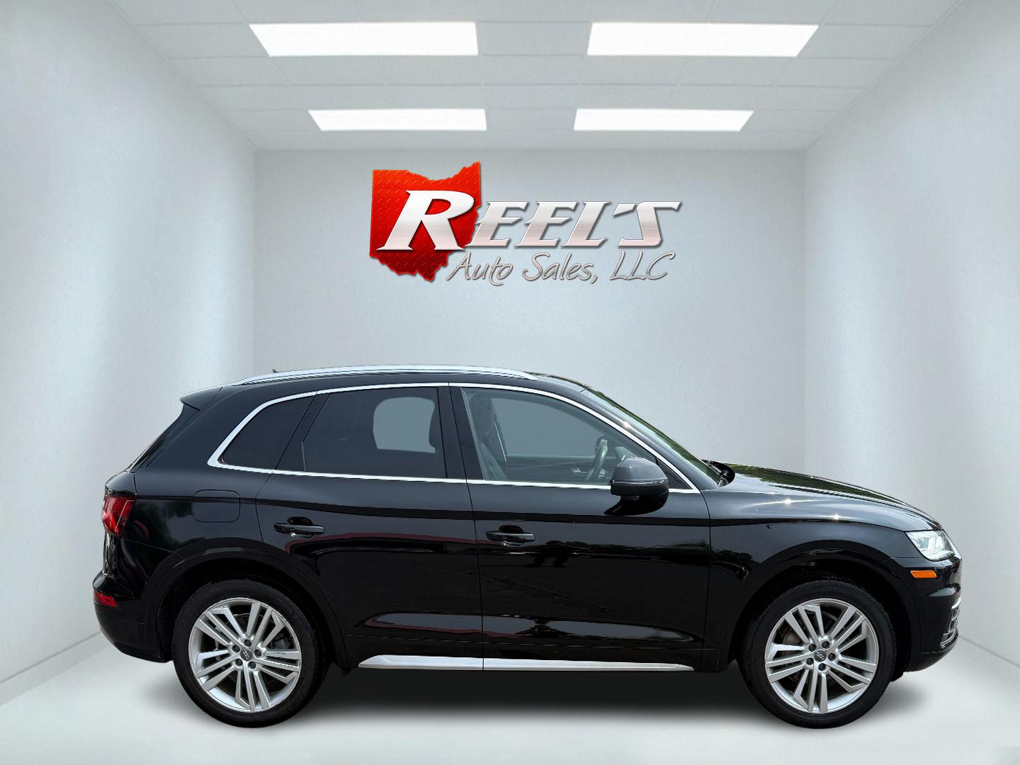 2018 Black /Black Audi Q5 2.0T Premium Plus quattro (WA1BNAFY0J2) with an 2.0L I4 DOHC 16V TURBO engine, 7A transmission, located at 547 E. Main St., Orwell, OH, 44076, (440) 437-5893, 41.535435, -80.847855 - This 2018 Audi G5 Premium Plus offers a refined driving experience with its 2.0L turbocharged I4 engine and 7-speed automatic transmission paired with Quattro all-wheel drive for superior handling. Its luxurious leather interior features power front seats, a heated steering wheel, and a Bang & Olufs - Photo#16