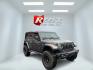 2018 Gray /Tan Jeep Wrangler JK Unlimited Rubicon (1C4HJXFG0JW) with an 3.6L V6 DOHC 24V engine, 8-Speed Automatic transmission, located at 11115 Chardon Rd. , Chardon, OH, 44024, (440) 214-9705, 41.580246, -81.241943 - This 2018 Jeep Wrangler Unlimited Rubicon features a 3.6L Pentastar V6 engine with an 8-speed automatic transmission, delivering robust performance and off-road capability, enhanced by Fox shocks. The interior boasts leather seats with heating, dual-zone automatic climate control, and an 8.4-inch to - Photo#2