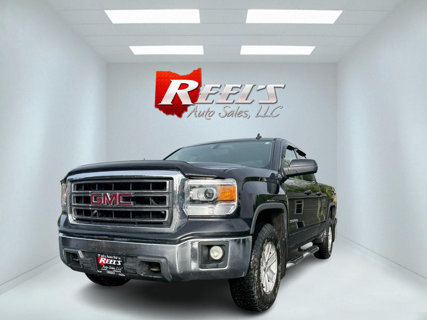 2014 Black /Black GMC Sierra 1500 SLE Double Cab 4WD (1GTV2UEC3EZ) with an 5.3L V8 OHV 16V engine, 6-Speed Automatic transmission, located at 11115 Chardon Rd. , Chardon, OH, 44024, (440) 214-9705, 41.580246, -81.241943 - Fresh Trade Alert ---- This 2014 GMC Sierra 1500 SLE Double Cab is a capable and feature rich truck. Powered by a 5.3 EcoTec 3 engine, 6 speed automatic transmission and 3.42 gearing this truck is rated to tow a very respectable 9,200 pounds. On the inside you get a power drivers seat, and dual zone - Photo#0
