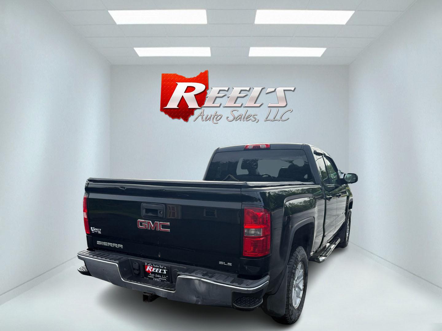 2014 Black /Black GMC Sierra 1500 SLE Double Cab 4WD (1GTV2UEC3EZ) with an 5.3L V8 OHV 16V engine, 6-Speed Automatic transmission, located at 11115 Chardon Rd. , Chardon, OH, 44024, (440) 214-9705, 41.580246, -81.241943 - Fresh Trade Alert ---- This 2014 GMC Sierra 1500 SLE Double Cab is a capable and feature rich truck. Powered by a 5.3 EcoTec 3 engine, 6 speed automatic transmission and 3.42 gearing this truck is rated to tow a very respectable 9,200 pounds. On the inside you get a power drivers seat, and dual zone - Photo#16