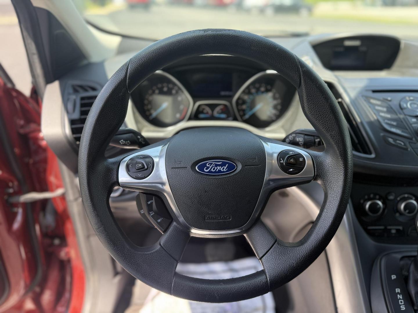 2015 Red /Black Ford Escape SE FWD (1FMCU0G75FU) with an 2.5L I4 DOHC 16V engine, 6-Speed Automatic transmission, located at 547 E. Main St., Orwell, OH, 44076, (440) 437-5893, 41.535435, -80.847855 - This 2015 Ford Escape SE FWD equipped with the 2.5L I4 Duratec engine offers impressive fuel efficiency, achieving around 30 MPG on the highway. It features a 6-speed automatic transmission, a power driver’s seat for comfort, and essential safety and convenience features including a backup camera, - Photo#15
