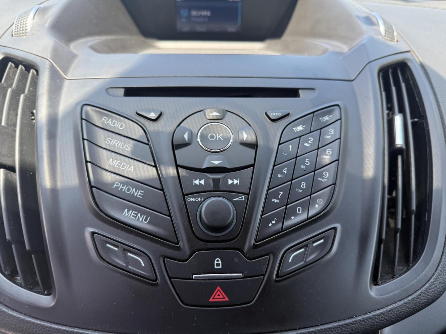 2015 Red /Black Ford Escape SE FWD (1FMCU0G75FU) with an 2.5L I4 DOHC 16V engine, 6-Speed Automatic transmission, located at 547 E. Main St., Orwell, OH, 44076, (440) 437-5893, 41.535435, -80.847855 - This 2015 Ford Escape SE FWD equipped with the 2.5L I4 Duratec engine offers impressive fuel efficiency, achieving around 30 MPG on the highway. It features a 6-speed automatic transmission, a power driver’s seat for comfort, and essential safety and convenience features including a backup camera, - Photo#19
