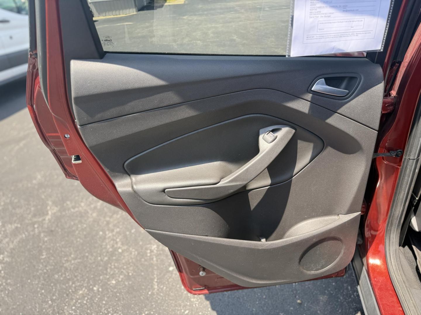 2015 Red /Black Ford Escape SE FWD (1FMCU0G75FU) with an 2.5L I4 DOHC 16V engine, 6-Speed Automatic transmission, located at 547 E. Main St., Orwell, OH, 44076, (440) 437-5893, 41.535435, -80.847855 - This 2015 Ford Escape SE FWD equipped with the 2.5L I4 Duratec engine offers impressive fuel efficiency, achieving around 30 MPG on the highway. It features a 6-speed automatic transmission, a power driver’s seat for comfort, and essential safety and convenience features including a backup camera, - Photo#24