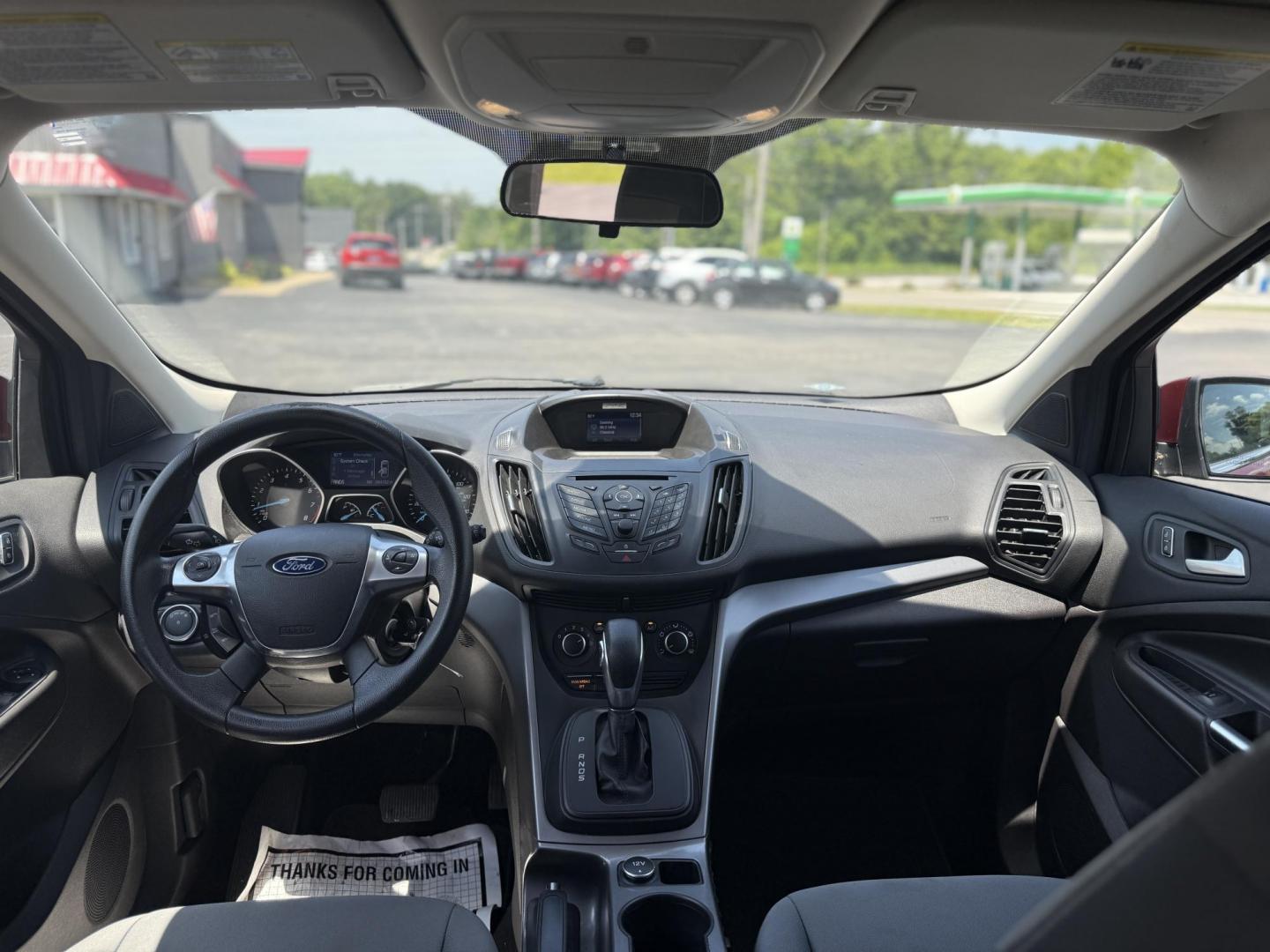 2015 Red /Black Ford Escape SE FWD (1FMCU0G75FU) with an 2.5L I4 DOHC 16V engine, 6-Speed Automatic transmission, located at 547 E. Main St., Orwell, OH, 44076, (440) 437-5893, 41.535435, -80.847855 - This 2015 Ford Escape SE FWD equipped with the 2.5L I4 Duratec engine offers impressive fuel efficiency, achieving around 30 MPG on the highway. It features a 6-speed automatic transmission, a power driver’s seat for comfort, and essential safety and convenience features including a backup camera, - Photo#26