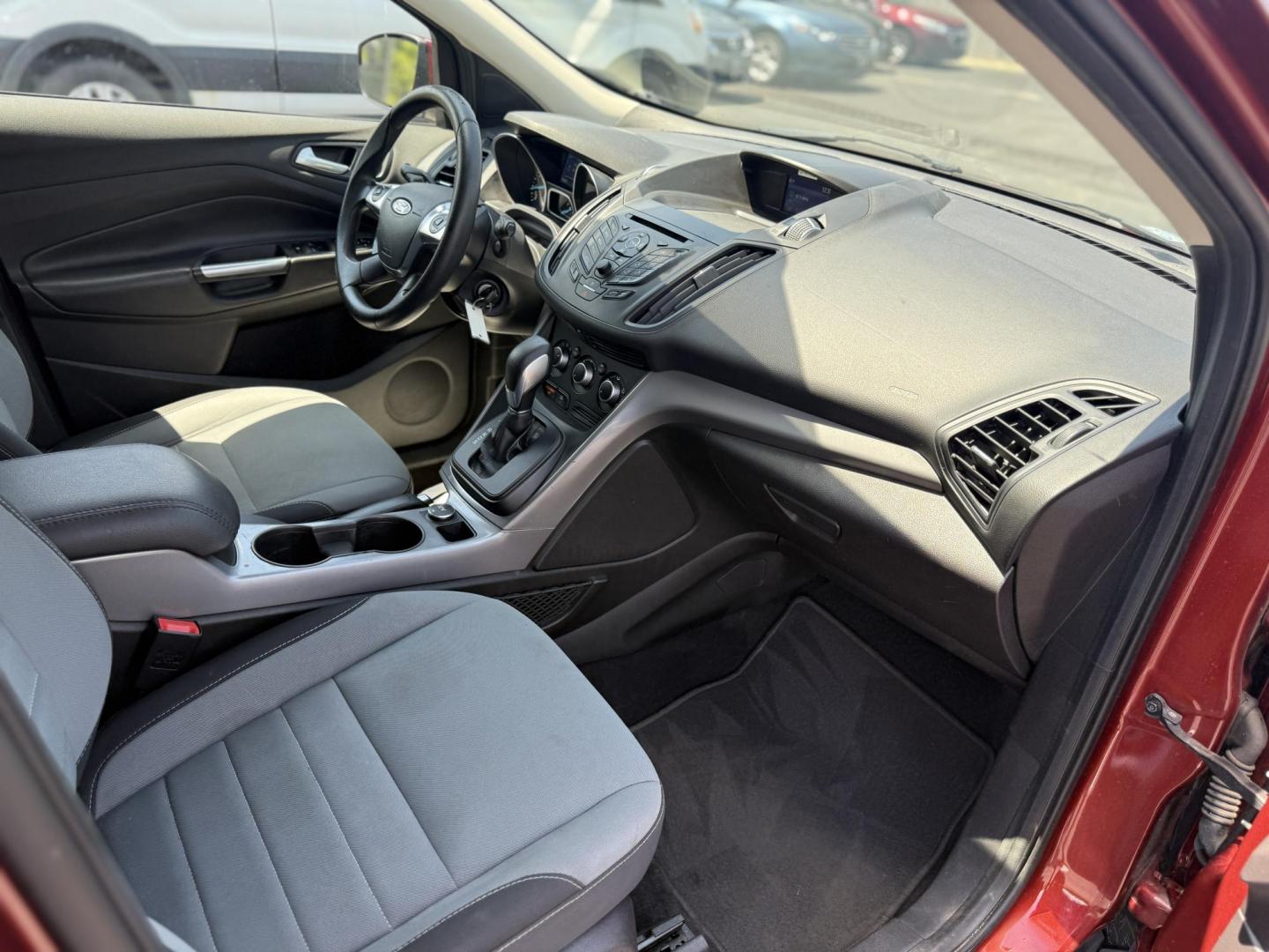2015 Red /Black Ford Escape SE FWD (1FMCU0G75FU) with an 2.5L I4 DOHC 16V engine, 6-Speed Automatic transmission, located at 547 E. Main St., Orwell, OH, 44076, (440) 437-5893, 41.535435, -80.847855 - This 2015 Ford Escape SE FWD equipped with the 2.5L I4 Duratec engine offers impressive fuel efficiency, achieving around 30 MPG on the highway. It features a 6-speed automatic transmission, a power driver’s seat for comfort, and essential safety and convenience features including a backup camera, - Photo#31