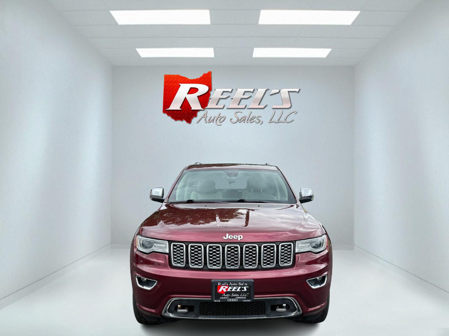 2017 Red /Tan Jeep Grand Cherokee Overland 4WD (1C4RJFCG8HC) with an 3.6L V6 DOHC 24V engine, 8A transmission, located at 547 E. Main St., Orwell, OH, 44076, (440) 437-5893, 41.535435, -80.847855 - This 2017 Jeep Grand Cherokee Overland 4WD, powered by a 3.6L Pentastar V6 and 8-speed automatic transmission, offers luxury and capability with features like leather interior, power/heated/cooled front seats, heated rear seats, a premium 825-watt 19-speaker Harman Kardon sound system, dual-pane pan - Photo#1