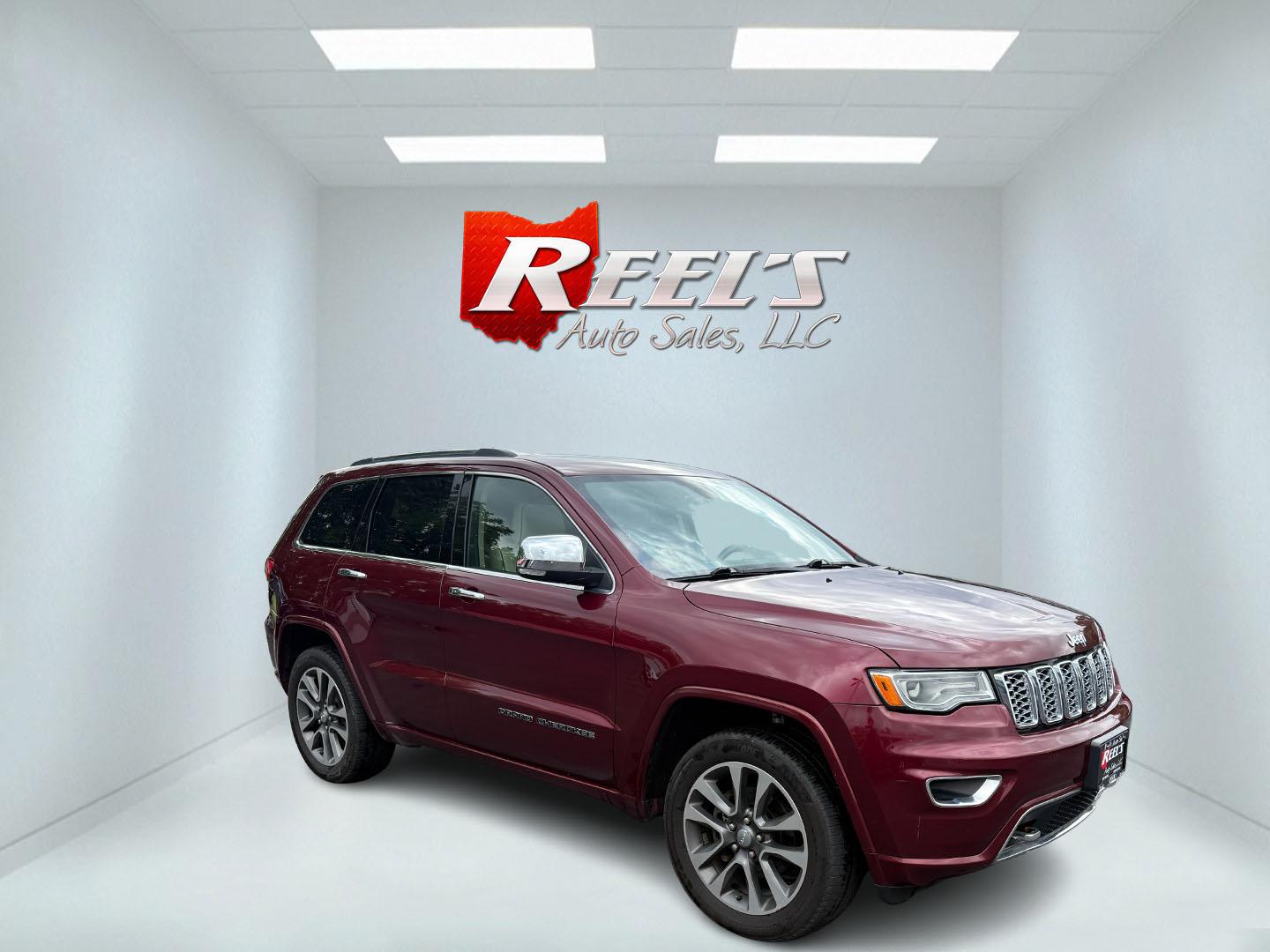 2017 Red /Tan Jeep Grand Cherokee Overland 4WD (1C4RJFCG8HC) with an 3.6L V6 DOHC 24V engine, 8A transmission, located at 547 E. Main St., Orwell, OH, 44076, (440) 437-5893, 41.535435, -80.847855 - This 2017 Jeep Grand Cherokee Overland 4WD, powered by a 3.6L Pentastar V6 and 8-speed automatic transmission, offers luxury and capability with features like leather interior, power/heated/cooled front seats, heated rear seats, a premium 825-watt 19-speaker Harman Kardon sound system, dual-pane pan - Photo#2