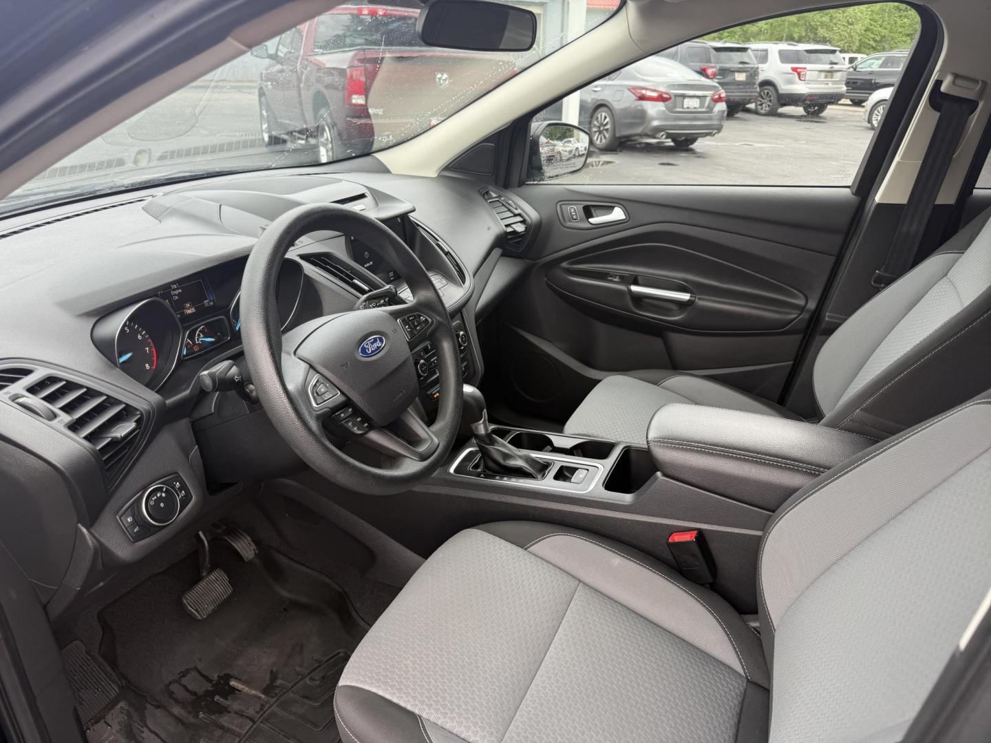 2017 Black /Gray Ford Escape SE 4WD (1FMCU9GDXHU) with an 1.5L I4 DOHC 16V Turbo engine, 6A transmission, located at 547 E. Main St., Orwell, OH, 44076, (440) 437-5893, 41.535435, -80.847855 - This 2017 Ford Escape SE 4WD with the 1.5L Turbocharged EcoBoost I4 engine combines efficiency and convenience, delivering approximately 28 MPG on the highway. It features a 6-speed automatic transmission, a power driver’s seat, and advanced safety with blind spot monitoring. The SUV is equipped w - Photo#8