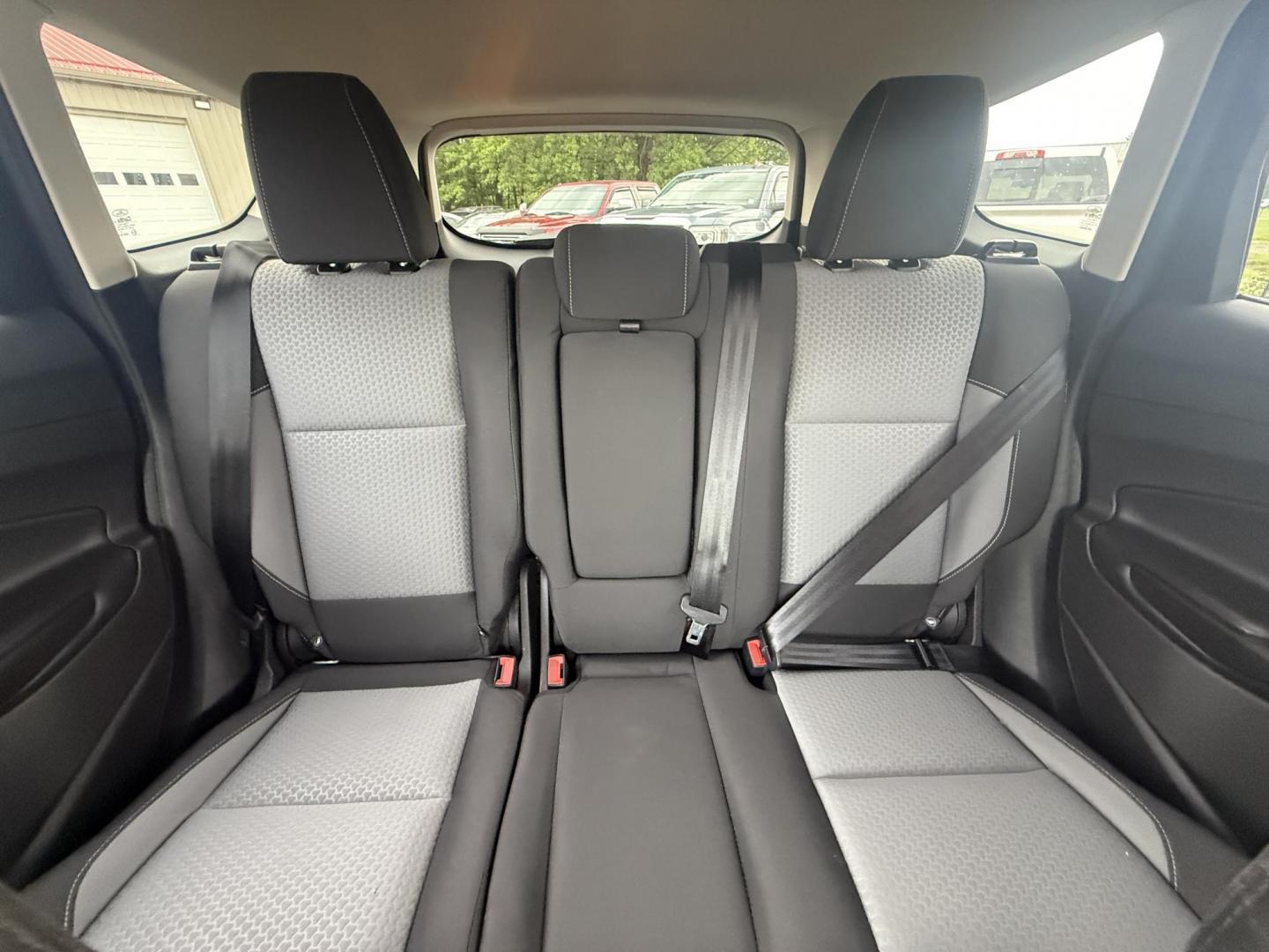 2017 Black /Gray Ford Escape SE 4WD (1FMCU9GDXHU) with an 1.5L I4 DOHC 16V Turbo engine, 6A transmission, located at 547 E. Main St., Orwell, OH, 44076, (440) 437-5893, 41.535435, -80.847855 - This 2017 Ford Escape SE 4WD with the 1.5L Turbocharged EcoBoost I4 engine combines efficiency and convenience, delivering approximately 28 MPG on the highway. It features a 6-speed automatic transmission, a power driver’s seat, and advanced safety with blind spot monitoring. The SUV is equipped w - Photo#20