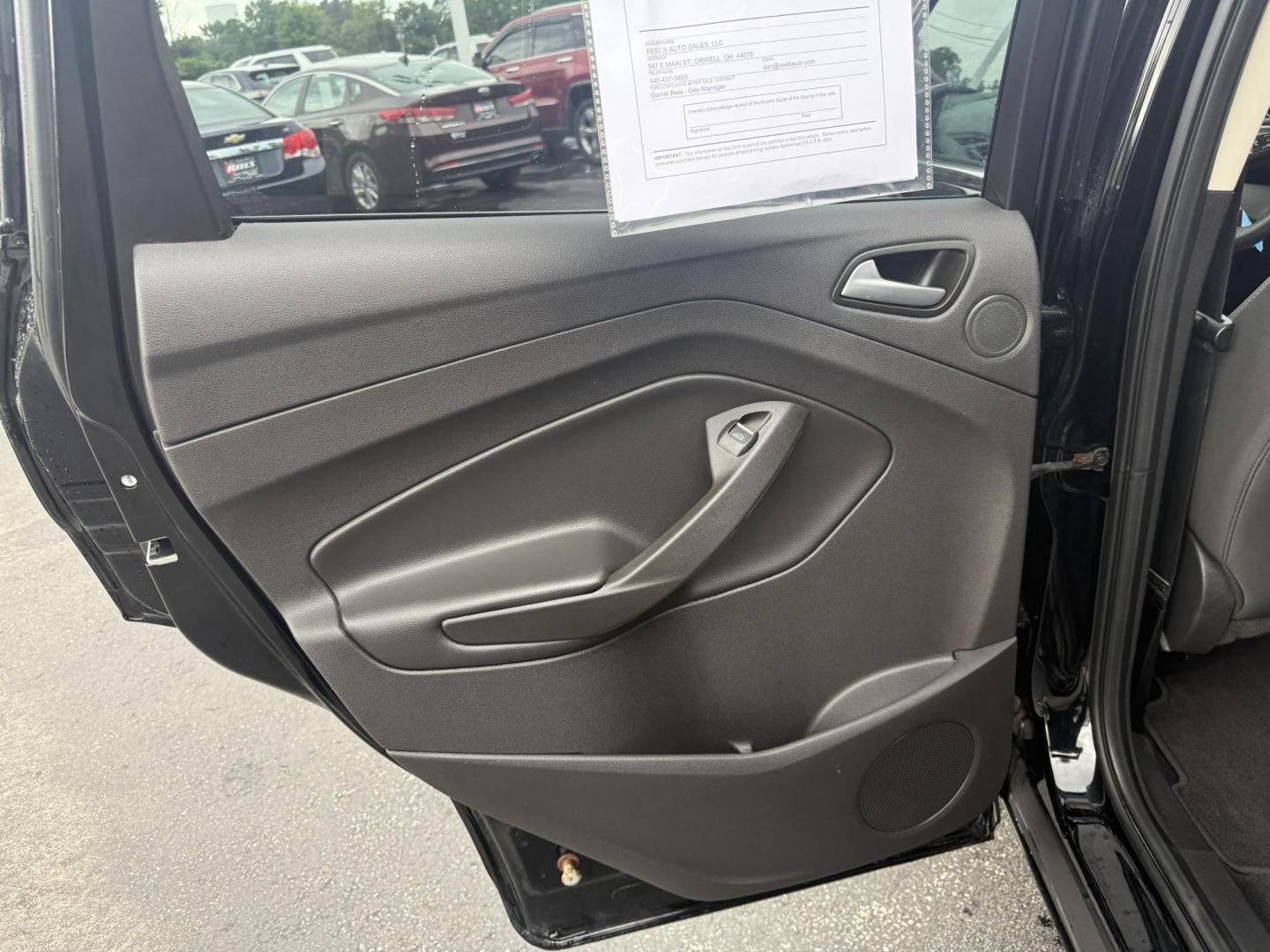 2017 Black /Gray Ford Escape SE 4WD (1FMCU9GDXHU) with an 1.5L I4 DOHC 16V Turbo engine, 6A transmission, located at 547 E. Main St., Orwell, OH, 44076, (440) 437-5893, 41.535435, -80.847855 - This 2017 Ford Escape SE 4WD with the 1.5L Turbocharged EcoBoost I4 engine combines efficiency and convenience, delivering approximately 28 MPG on the highway. It features a 6-speed automatic transmission, a power driver’s seat, and advanced safety with blind spot monitoring. The SUV is equipped w - Photo#22