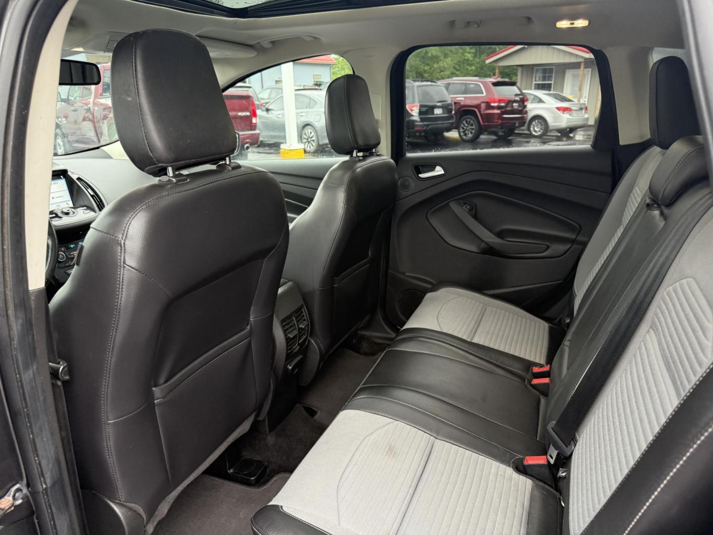 2019 Black /Black Ford Escape Titanium 4WD (1FMCU9J95KU) with an 2.0L I4 DOHC 16V TURBO engine, 6 Speed Auto transmission, located at 547 E. Main St., Orwell, OH, 44076, (440) 437-5893, 41.535435, -80.847855 - Photo#24