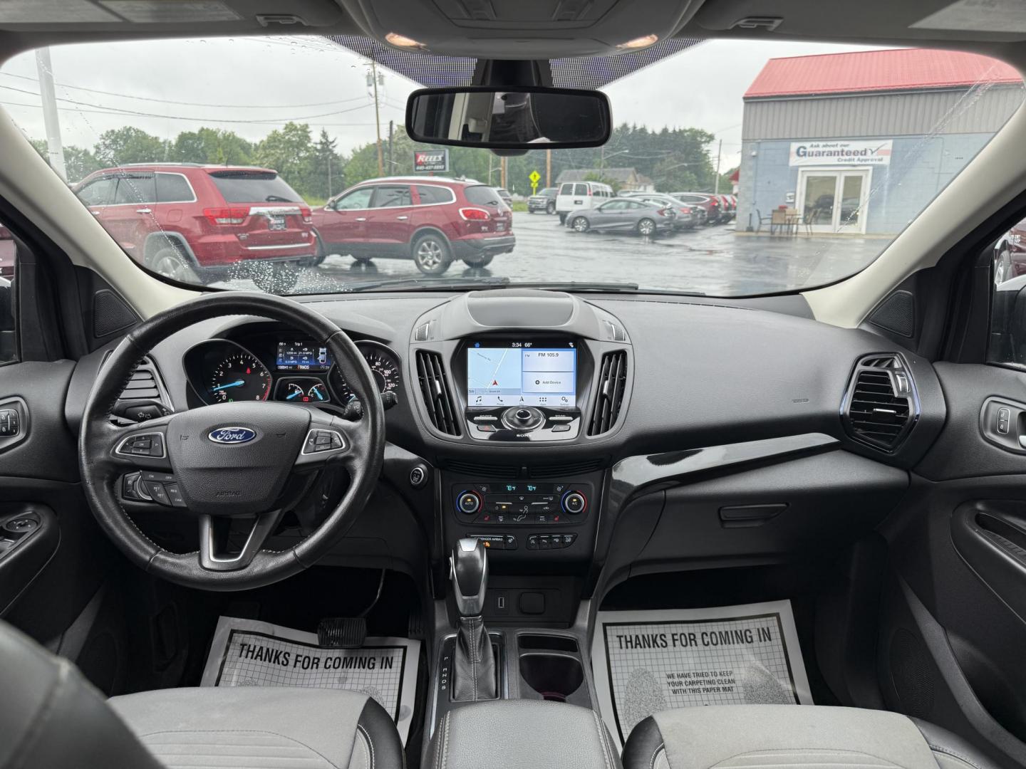 2019 Black /Black Ford Escape Titanium 4WD (1FMCU9J95KU) with an 2.0L I4 DOHC 16V TURBO engine, 6 Speed Auto transmission, located at 547 E. Main St., Orwell, OH, 44076, (440) 437-5893, 41.535435, -80.847855 - Photo#28